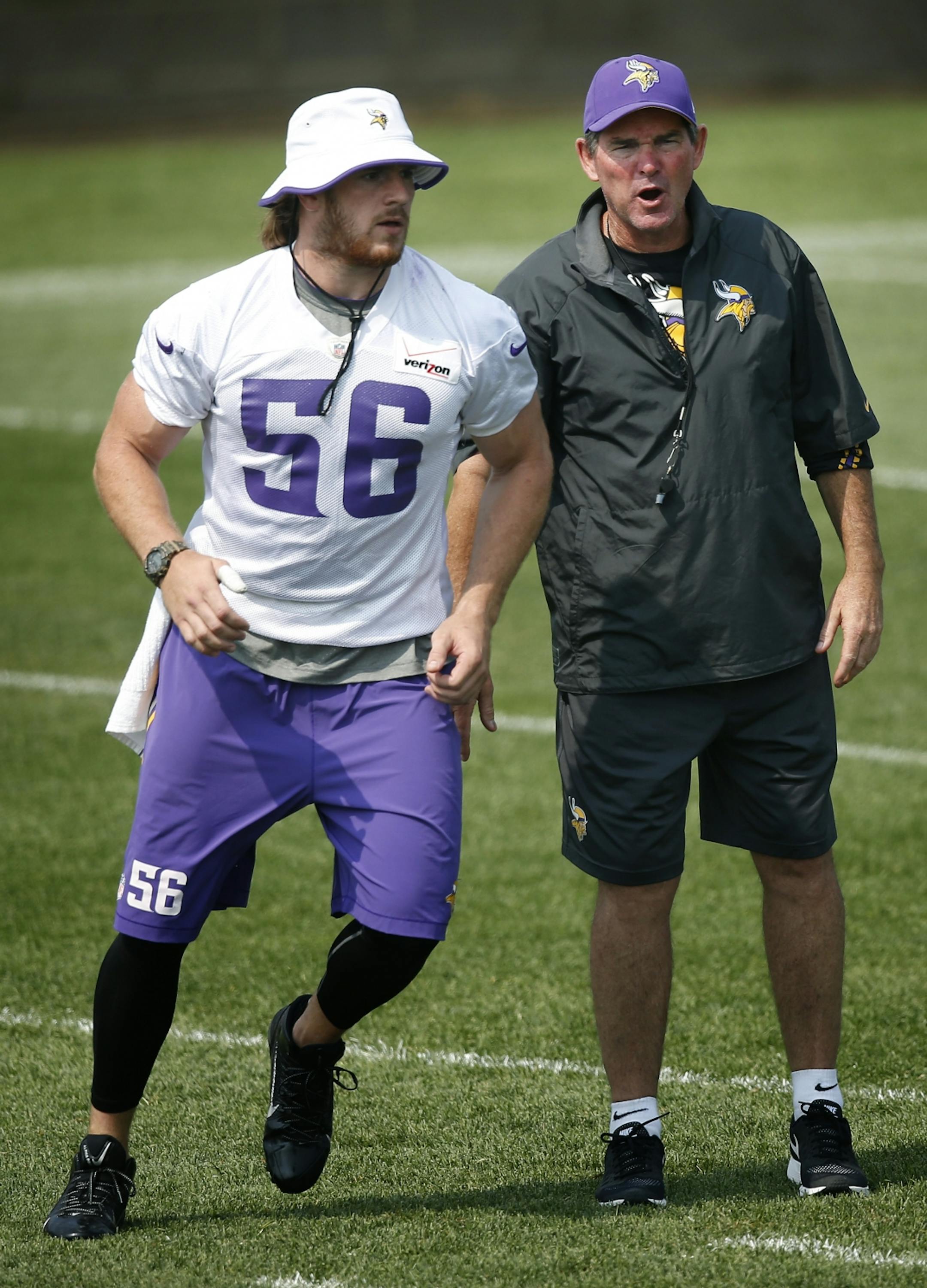 Minnesota Vikings head coach Mike Zimmer and Michael Mauti.