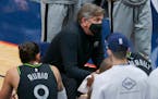 Minnesota Timberwolves coach Chris Finch talks with players during the first half of the team's NBA basketball game against the New Orleans Pelicans i