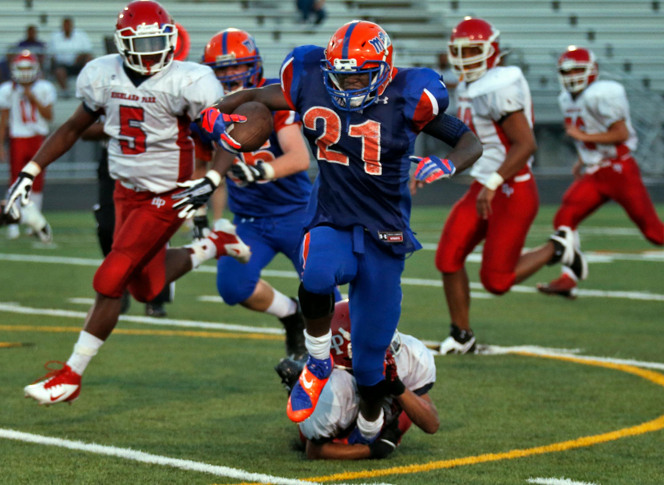 Washburn running back Jeff Jones left Highland Park tacklers behind.