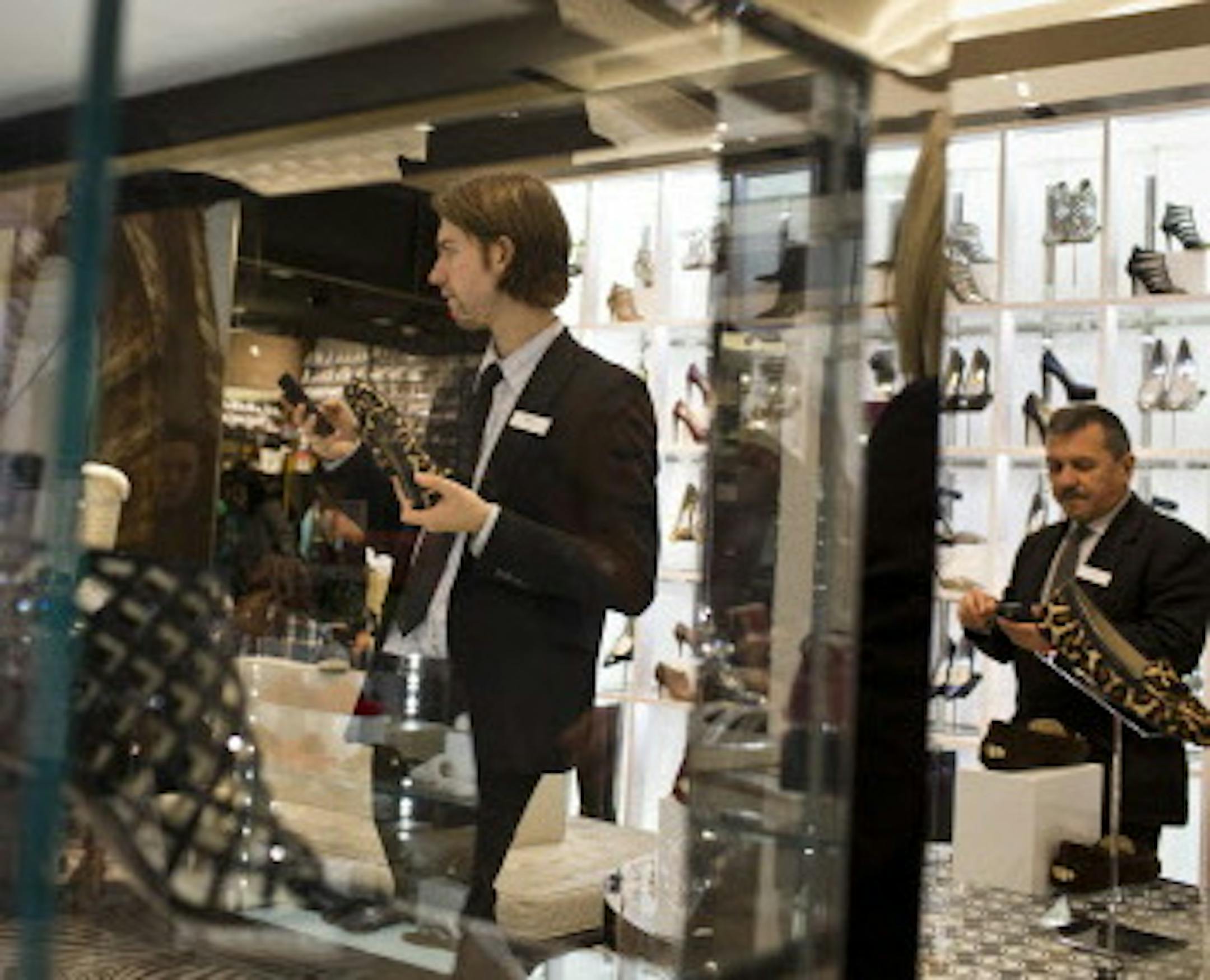 FILE ‚Äî Staff in the shoe section of the Macy‚Äôs flagship store in New York, Oct. 17, 2014. The retailer is bullish on its gains, but the overall sector may be less buoyant. (Todd Heisler/The New York Times)