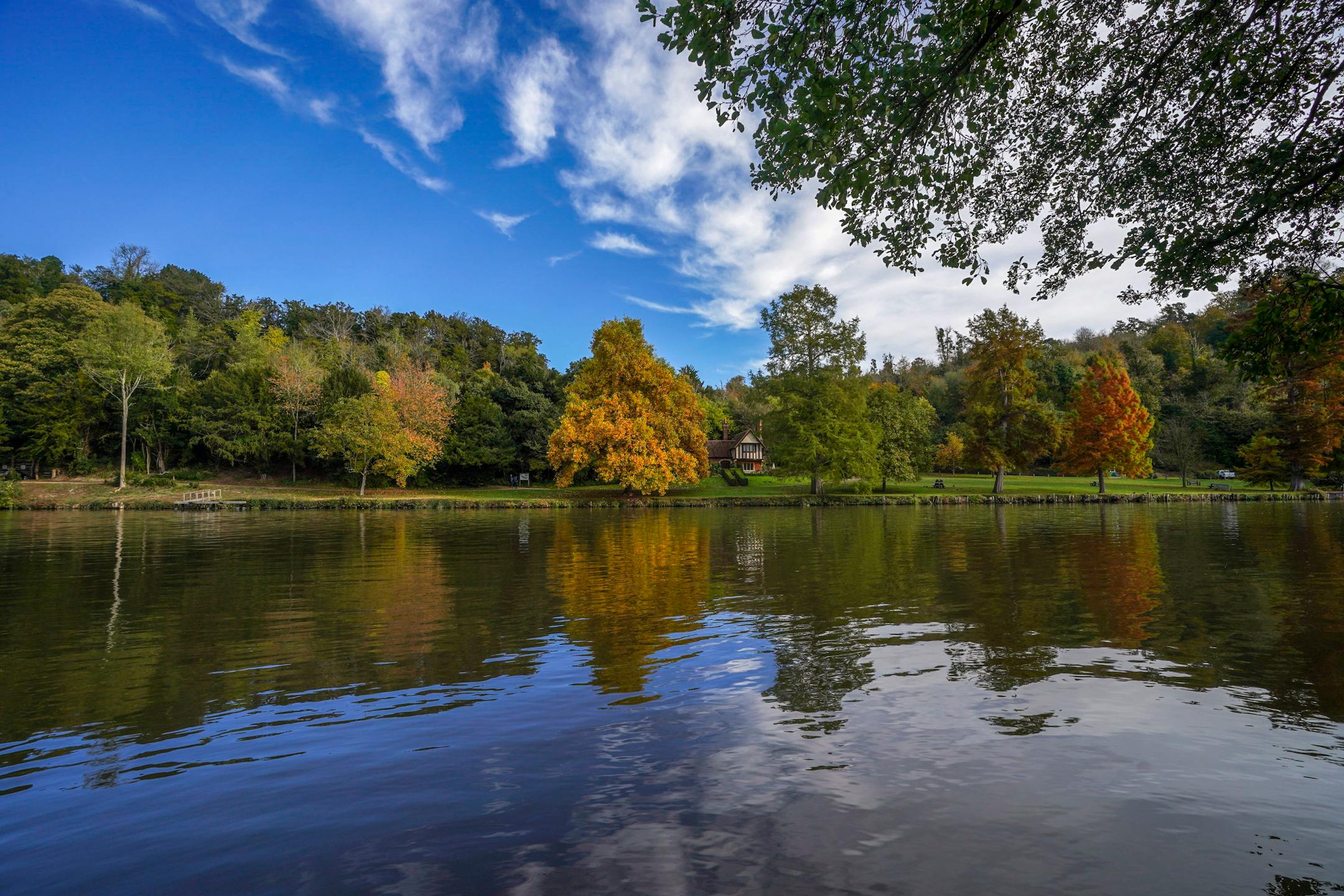 Autumn trees line the River Thames near Cliveden in Buckinghamshire, England, Tuesday, Nov. 2, 2021. (Steve Parsons/PA via AP)