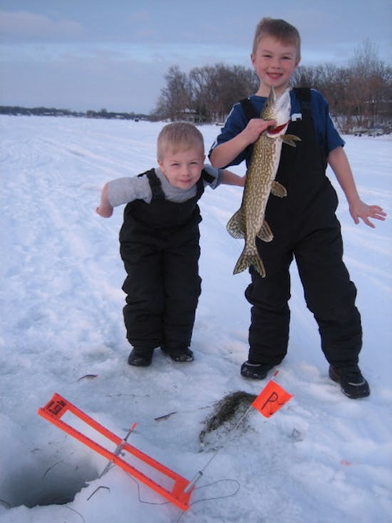 Tip-ups! The perfect way to hook kids into ice fishing.
