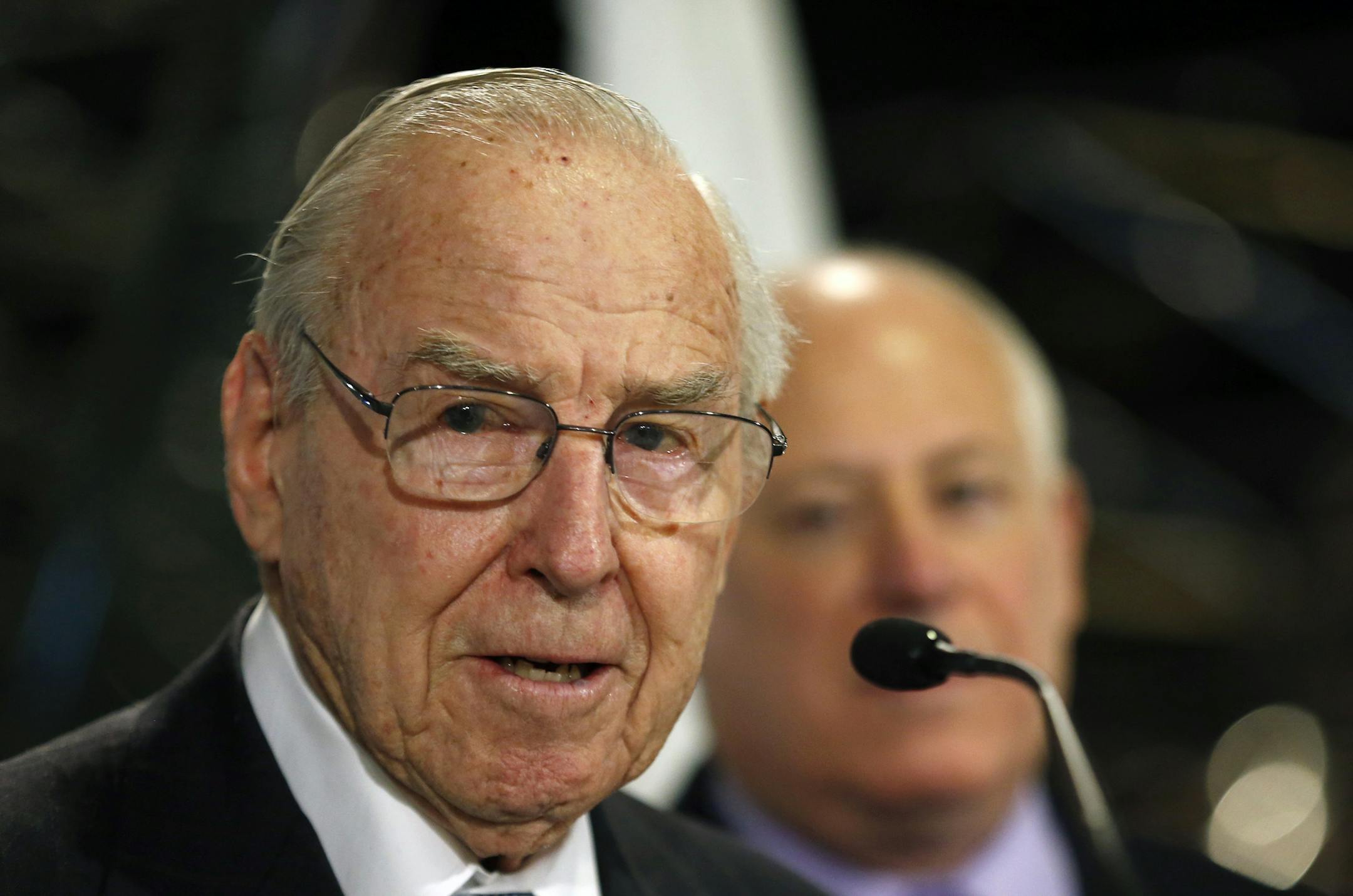 Captain James A. Lovell, Jr., speaks during 45th Anniversary of Apollo 8 "Christmas Eve Broadcast to Earth" event at the Museum of Science and Industry in Chicago, Monday, Dec. 23, 2013. (AP Photo/Kamil Krzaczynski)