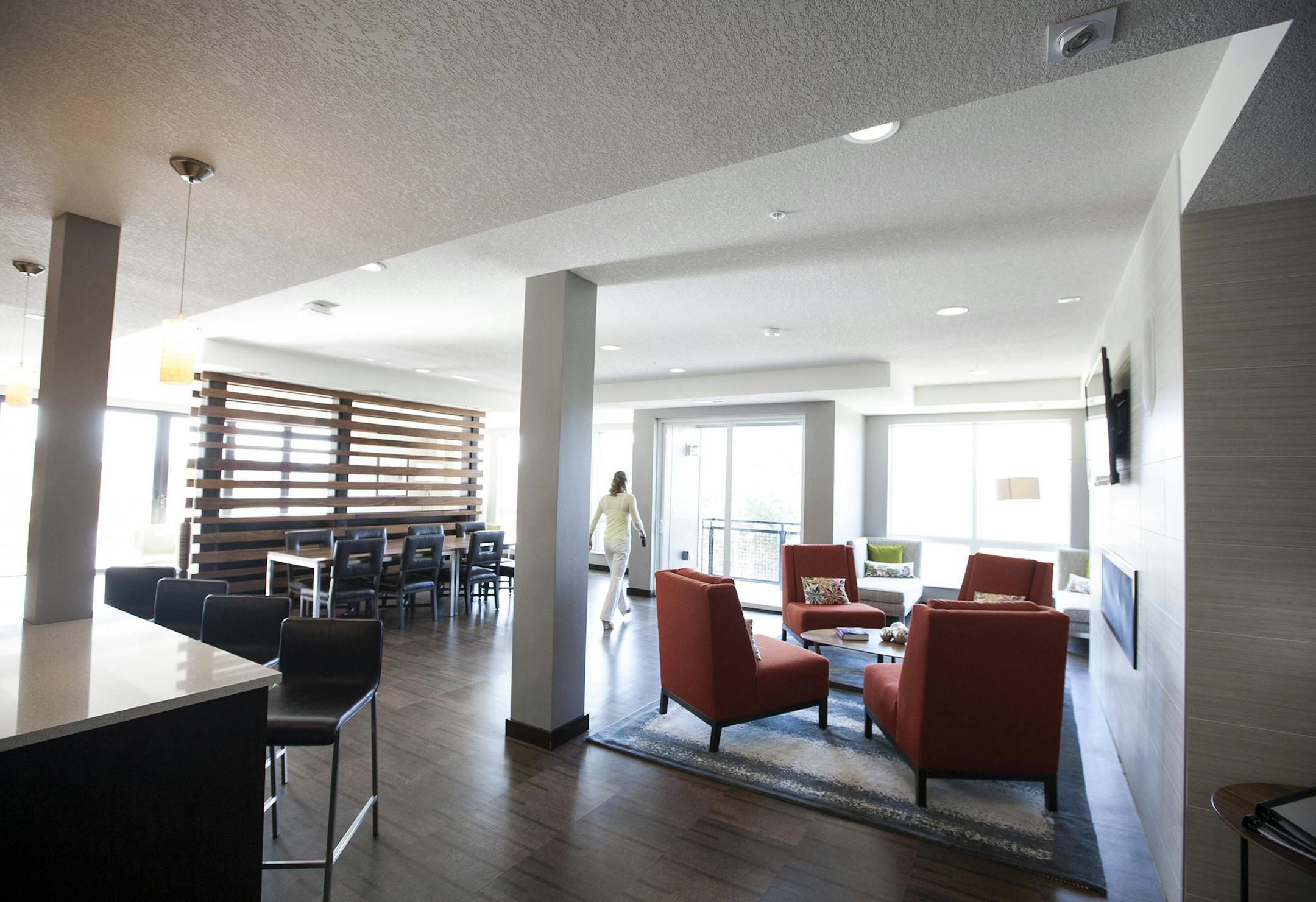 Community space at Mill and Main Luxury Apartments in Minneapolis opens up to a central terrace. Photographed April 21, 2014. (Courtney Perry/Special to the Star Tribune)