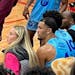 Paige Bueckers served as guest coach Monday and drew up plays for longtime friend and current NBA player Jalen Suggs, right.