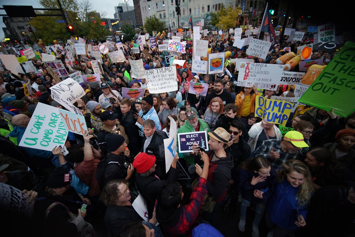 Supporters and protesters interact outside Target Center in Minneapolis ahead of a campaign rally by President Donald Turmp on Thursday, Oct. 10, 2019. (Renee Jones Schneider/Minneapolis Star Tribune/TNS) ORG XMIT: 1456889