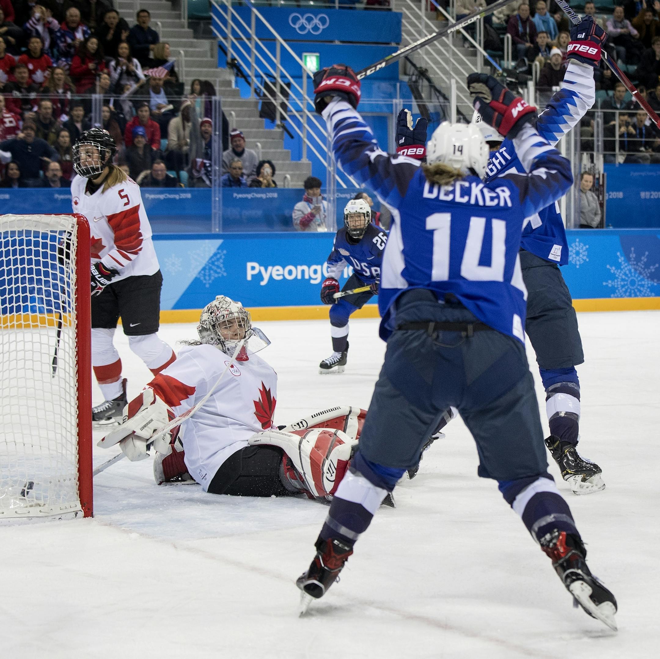 Hilary Knight (21) celebrated with teammates after scoring a power play goal in the first period.