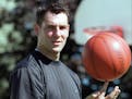 Former Gophers star Sam Jacobson, shown in this July 5, 2001 file photo, is facing felony charges over the sale of his house in Apple Valley.