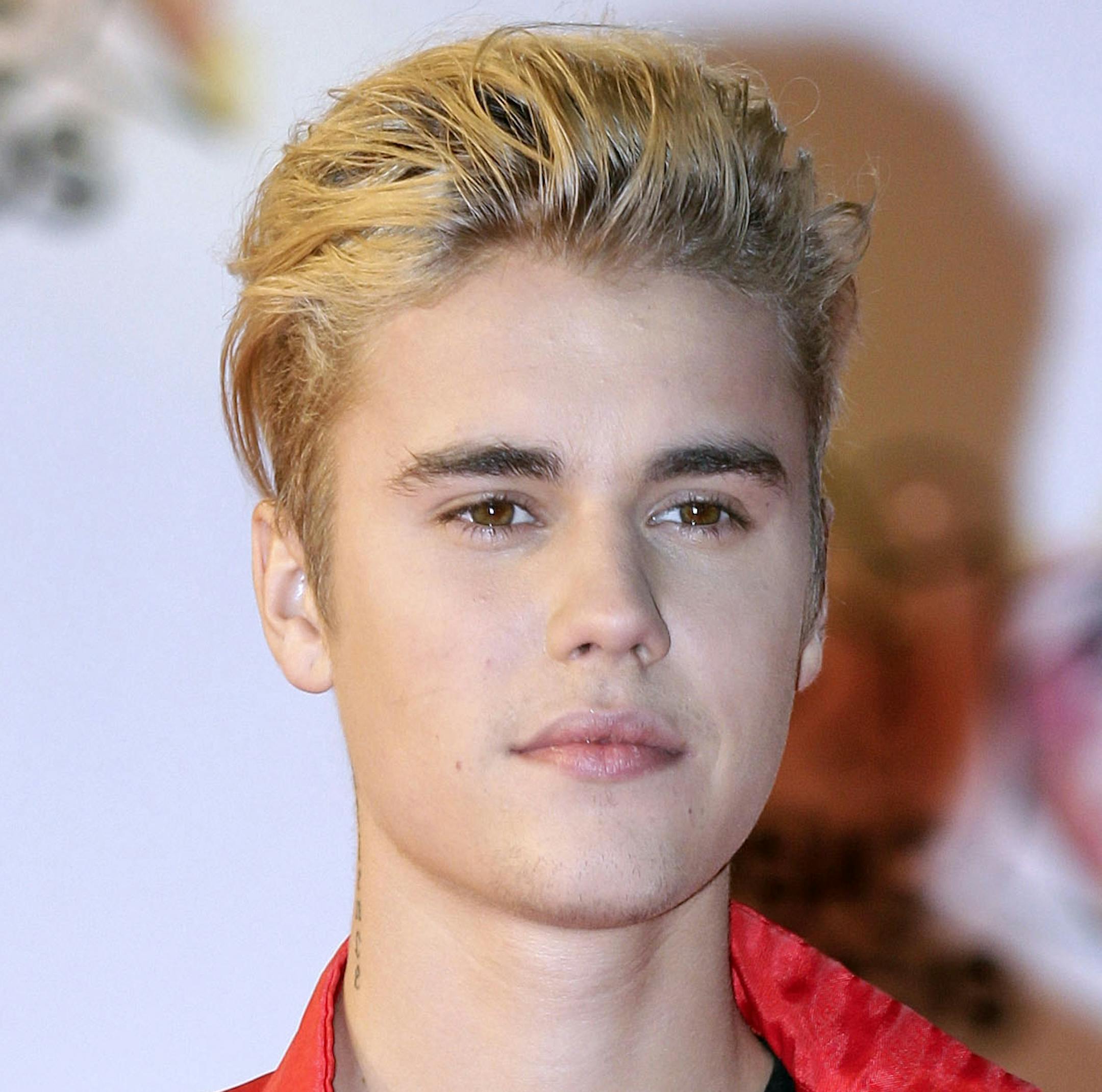 FILE - In this Nov. 7, 2015 file photo, Justin Bieber arrives at the Cannes festival palace in Cannes, southeastern France. Bieber is canceling the rest of his Purpose World Tour “due to unforeseen circumstances.” In a statement released Monday, July 24, 2017, his representatives didn’t offer details about the cancellation but said the singer “loves his fans and hates to disappoint them.” He has been on the tour for the last 18 months, playing more than 150 sho
