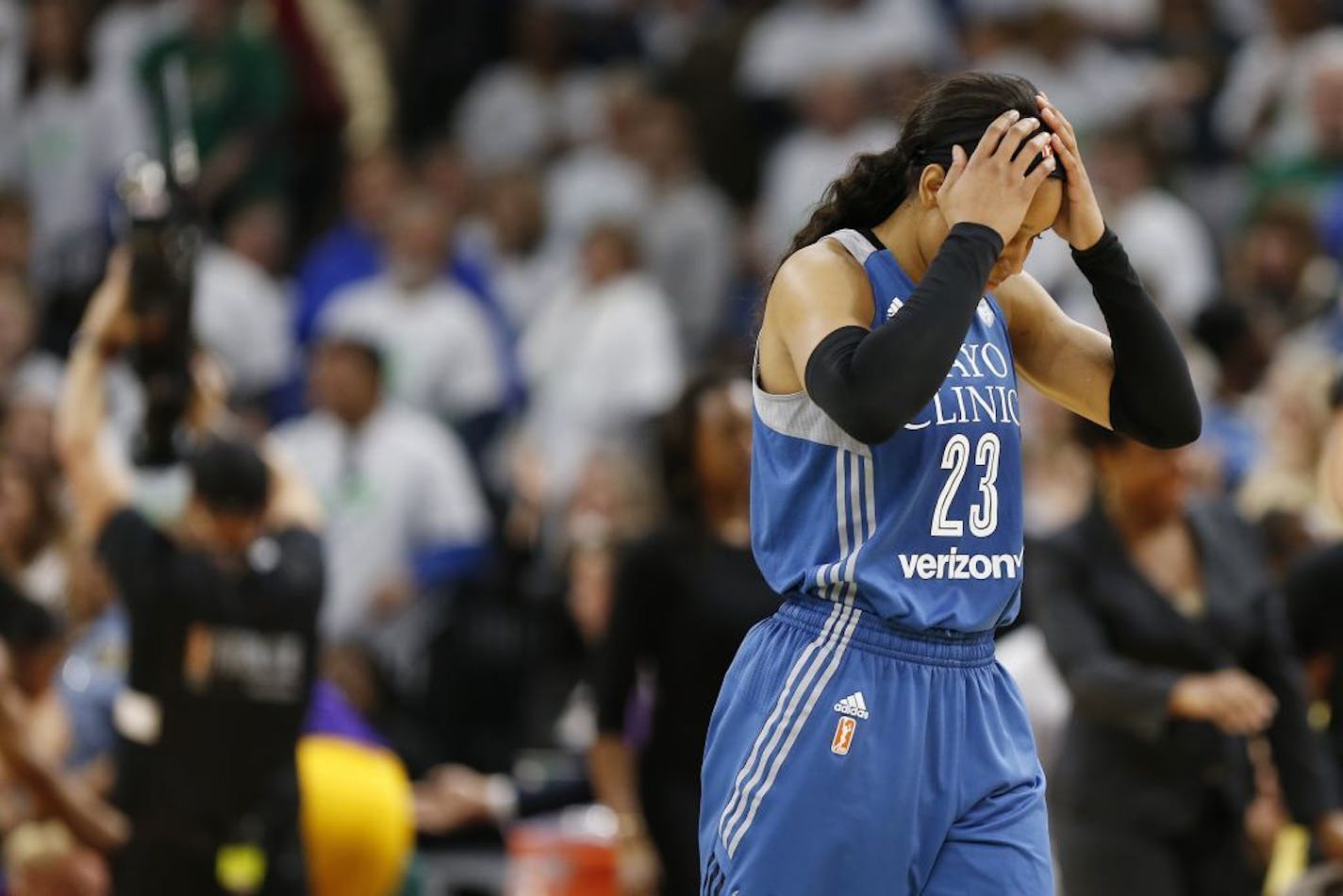 Minnesota Lynx forward Maya Moore (23) walks off the court after her team lost Game 1 of the WNBA basketball finals to the Los Angeles Sparks, Sunday, Oct. 9, 2016, in Minneapolis. Los Angeles won 78-76.