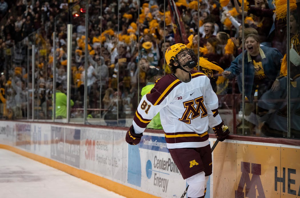 Jimmy Snuggerud celebrated with Gophers fans earlier this season.