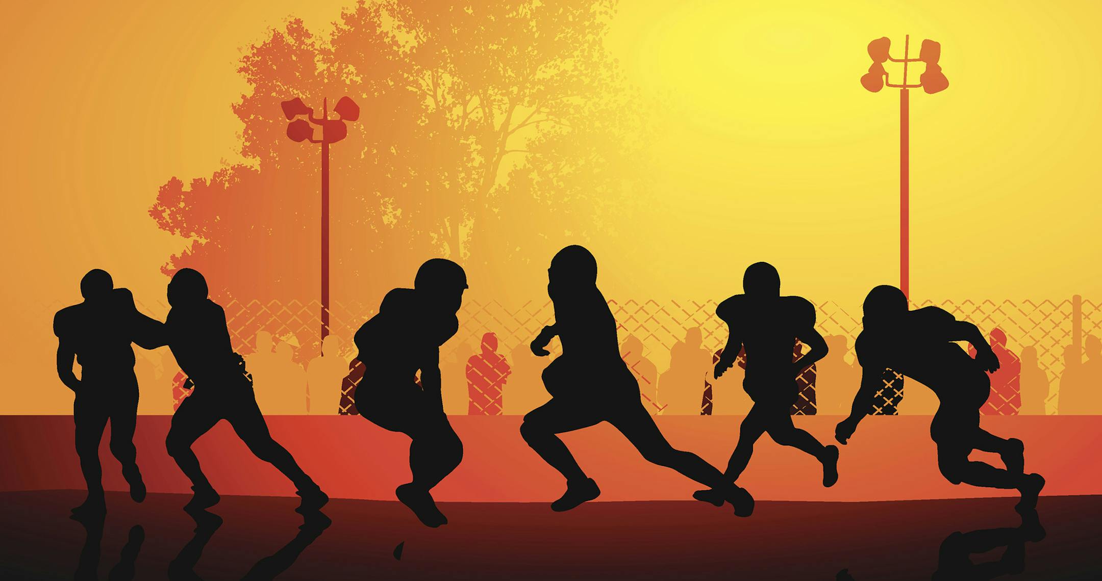 iStockphoto.com
High schoolers playing football, with spectators watching.