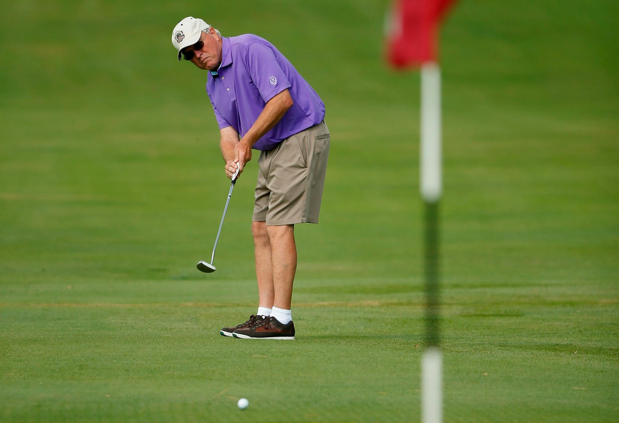 Art Hennington putting onto the seventh green at Town and Country Club in St. Paul last Thursday, the same day he accomplished his goal of golfing in every course in Minnesota.