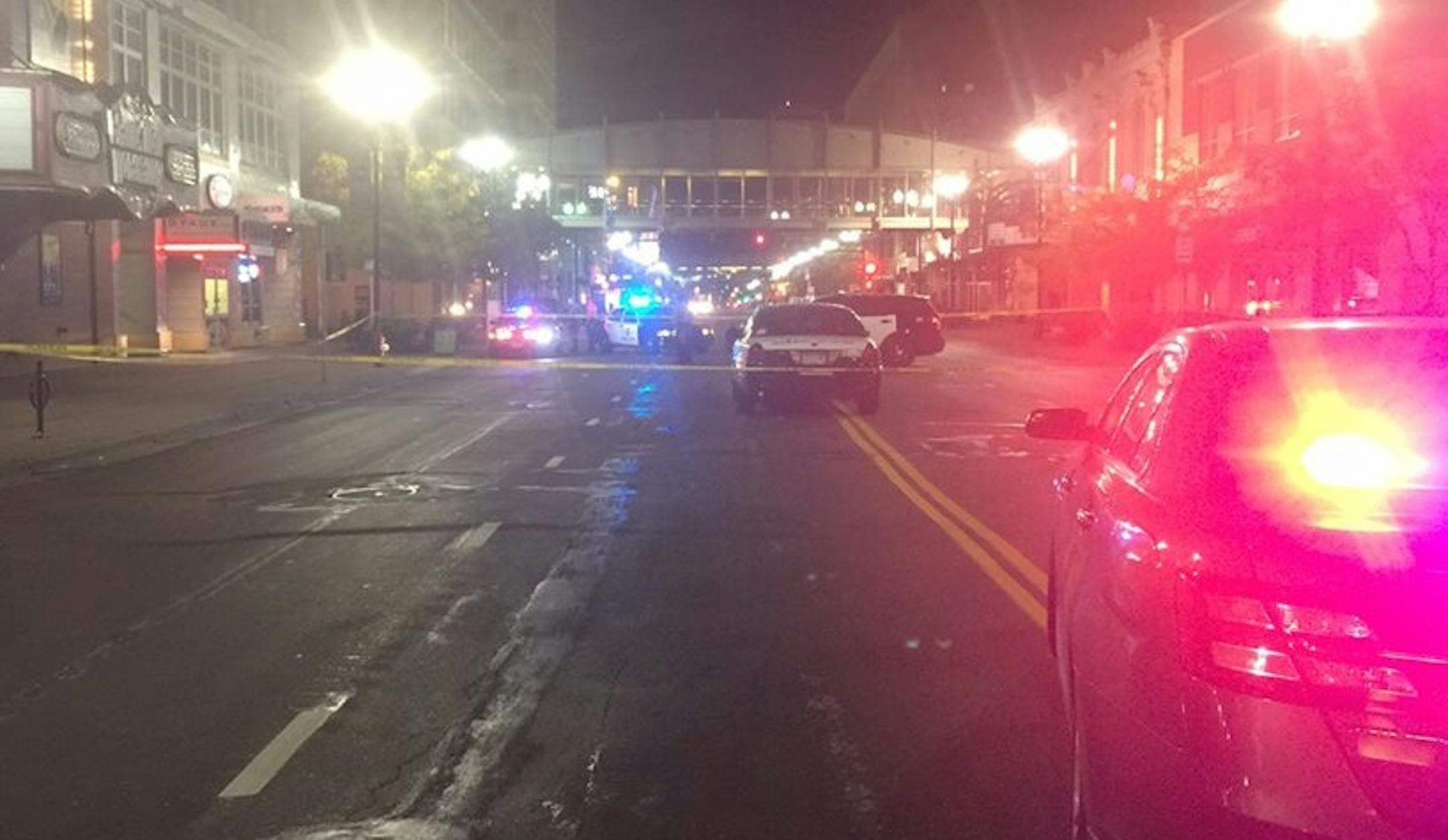 A cab remained in Hennepin Avenue behind police tape after hitting a pedestrian who was crossing in the middle of the block.