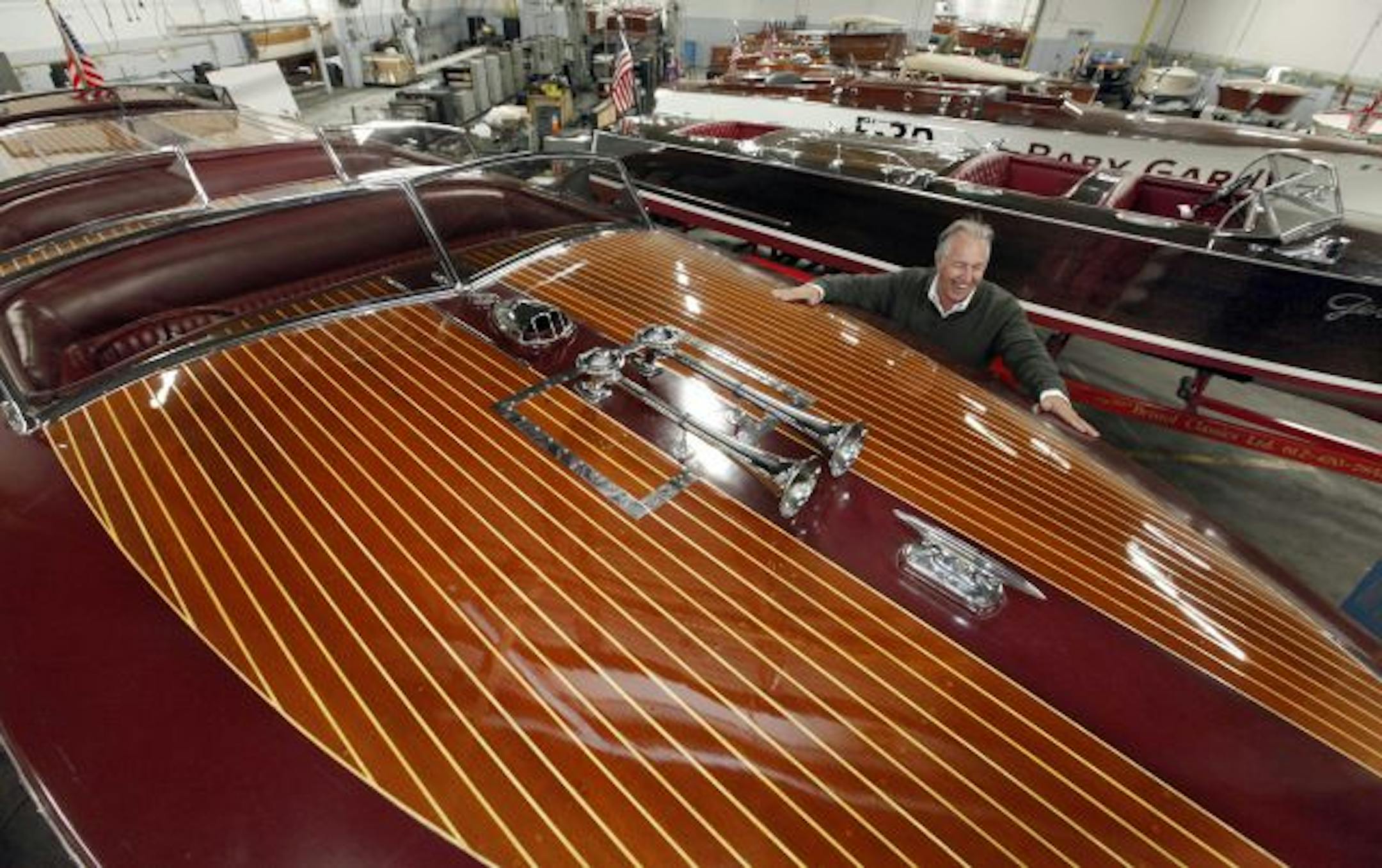 Todd Warner lovingly lays his hands on the glitzy speedboat Thunderballs, knowing it may be for the last time before it goes to auction next weekend.
