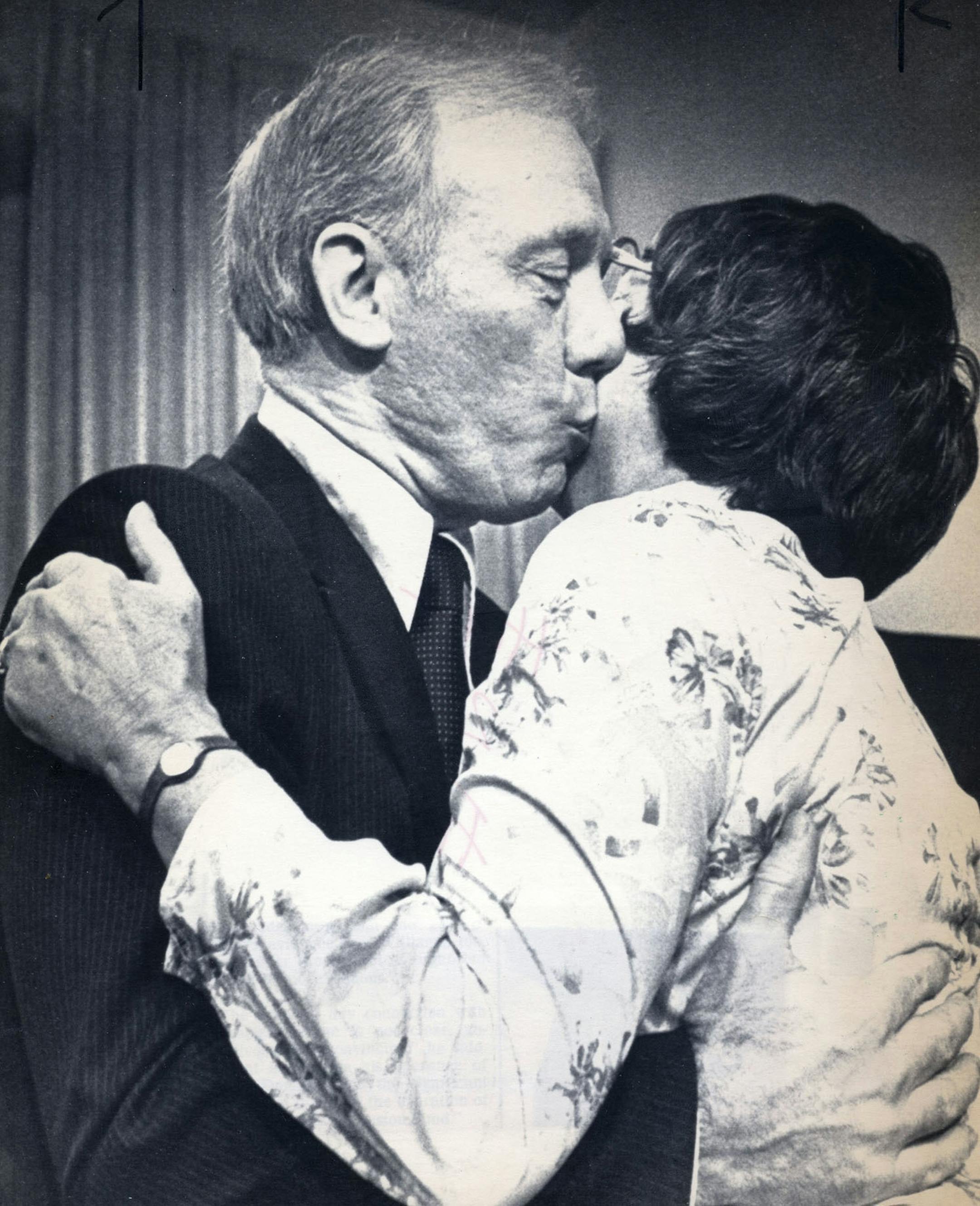 St Paul, MN March 31, 1983 - AP photo - Jim Mone -- Laraine Western, mother of freelance journalist Thomas Western and U.S. Rep. James Oberstar embraced prior to a press contference on day after Oberstar aided in the release of Western and another journalist from a jail in El Salvador.