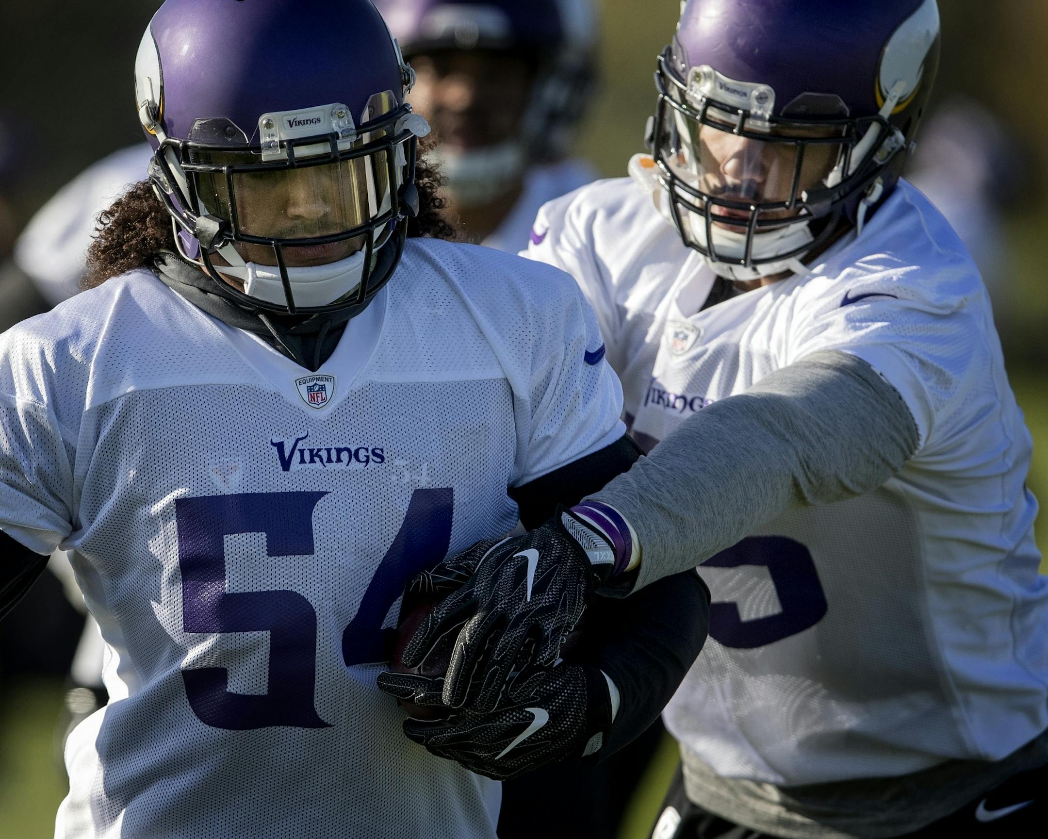 Minnesota Vikings linebackers Eric Kendricks (54) and Anthony Barr during a ball stripping drill at practice at the London Irish Training Ground in perpetration for a game vs. the Cleveland Browns.