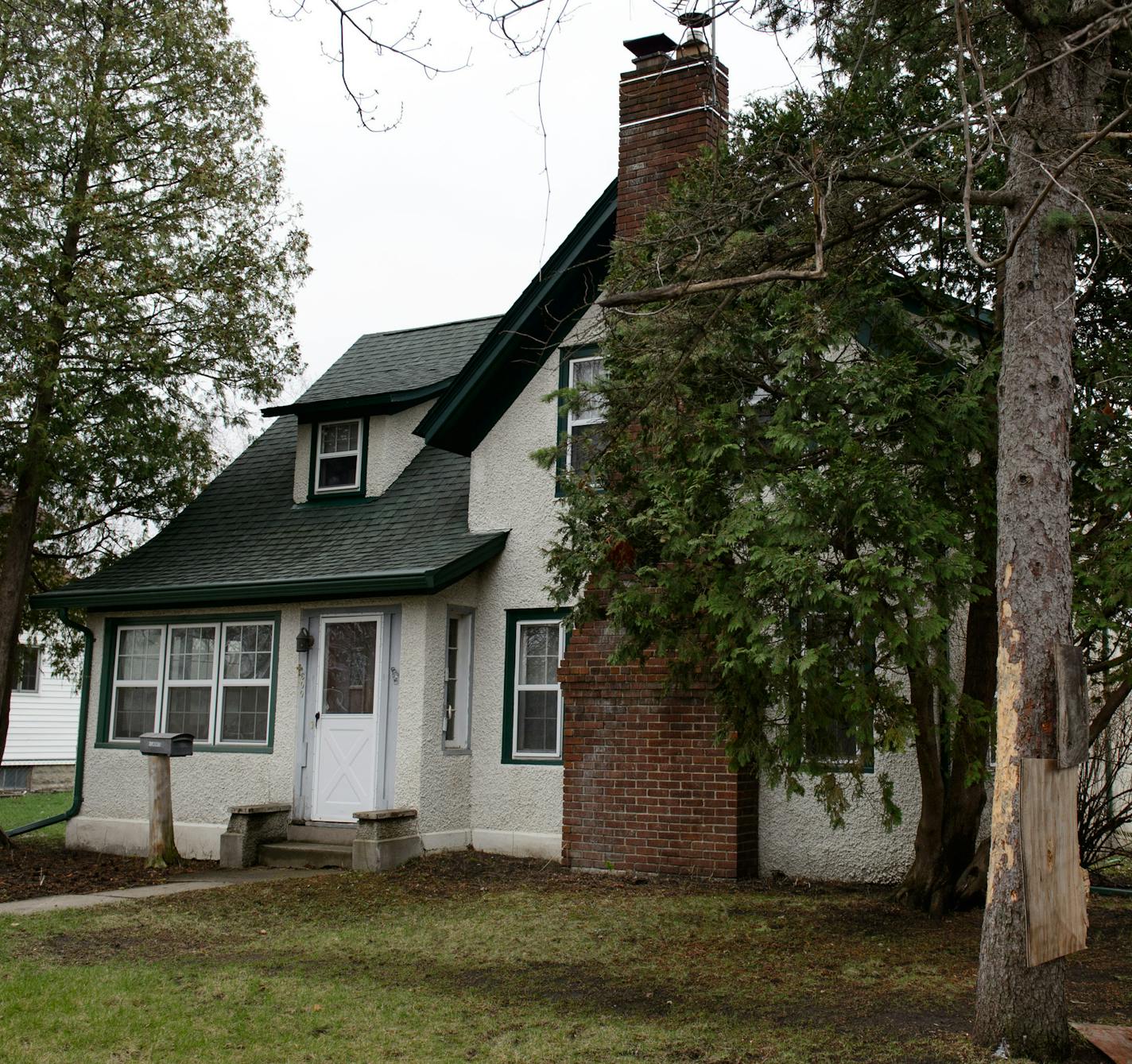 The Waseca home of John Ladue including a tree where neighbors watched him throw knoves and axes at a pine tree. 17-year-old arrested in plot to kill family and massacre students at Waseca school. ] Thursday, May 1, 2014 GLEN STUBBE * gstubbe@startribune.com