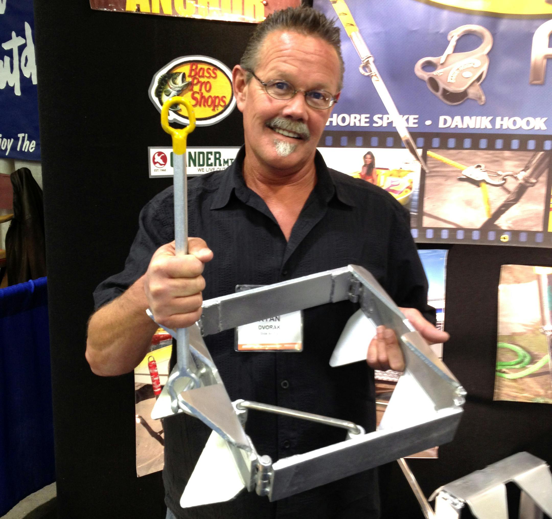Ryan Dvorak of Lake Havasu City, Ariz., at the Boat Show Thursday with his Box Anchor, which he says will hold boats of all sizes in all conditions.