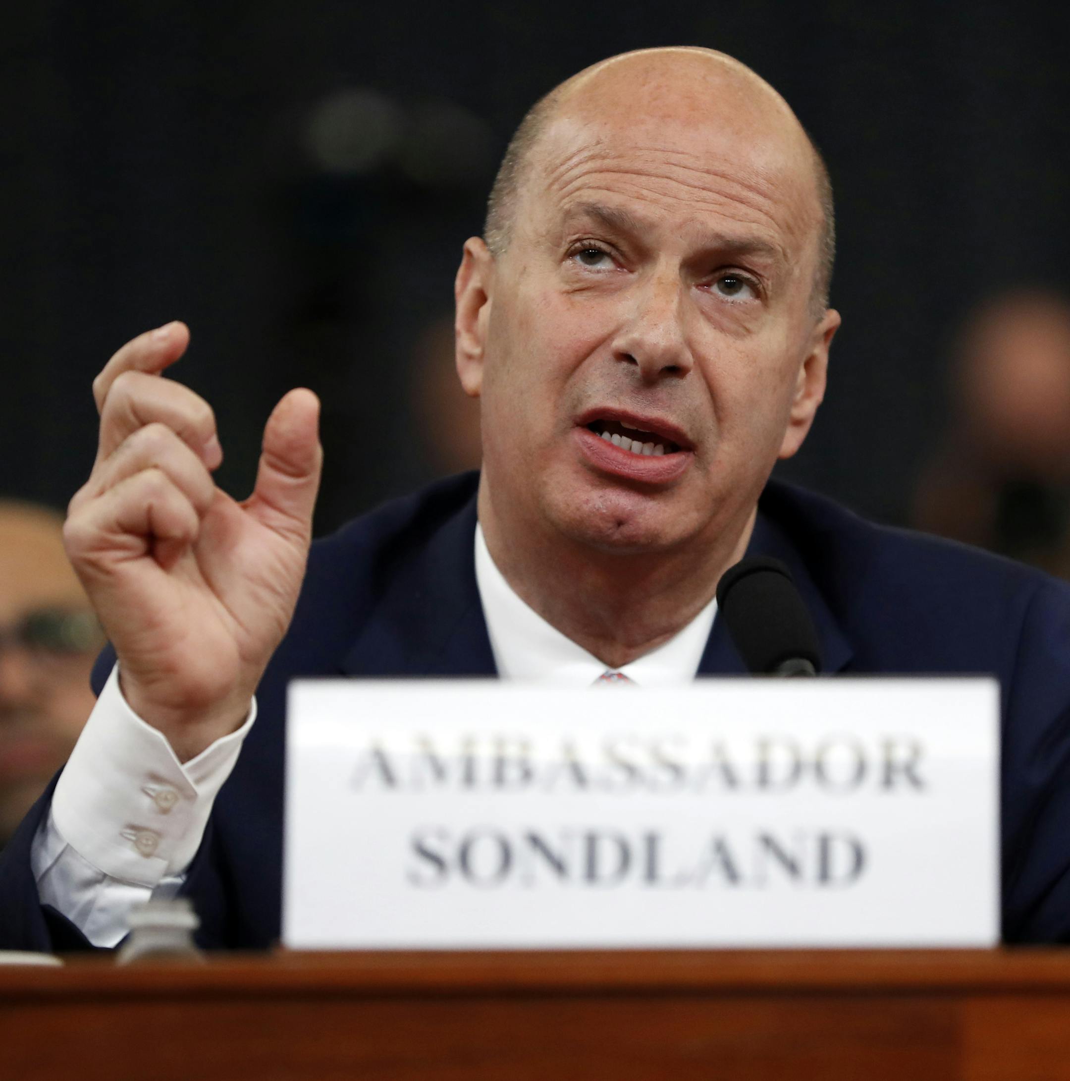 FILE - In this Wednesday, Nov. 20, 2019, file photo, U.S. Ambassador to the European Union Gordon Sondland testifies before the House Intelligence Committee on Capitol Hill in Washington, during a public impeachment hearing of President Donald Trump's efforts to tie U.S. aid for Ukraine to investigations of his political opponents. For readers of some prominent regional newspapers, following the impeachment inquiry is a far different experience depending on whether you seek out newsprint or go d