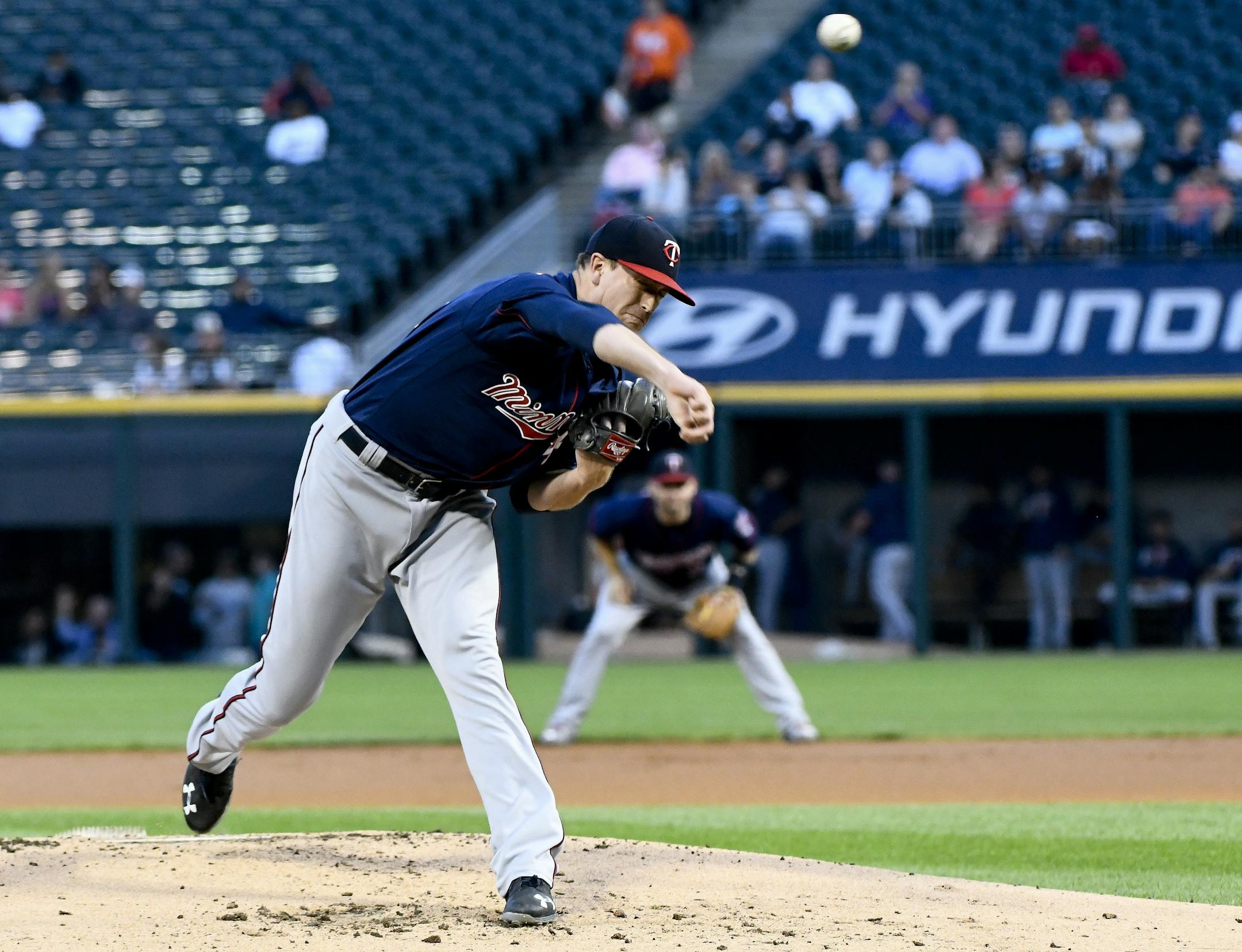 Minnesota Twins starting pitcher Kyle Gibson (44) delivers against the Chicago White Sox during the first inning of a baseball game in Chicago on Tuesday, Aug. 22, 2017. (AP Photo/Matt Marton)