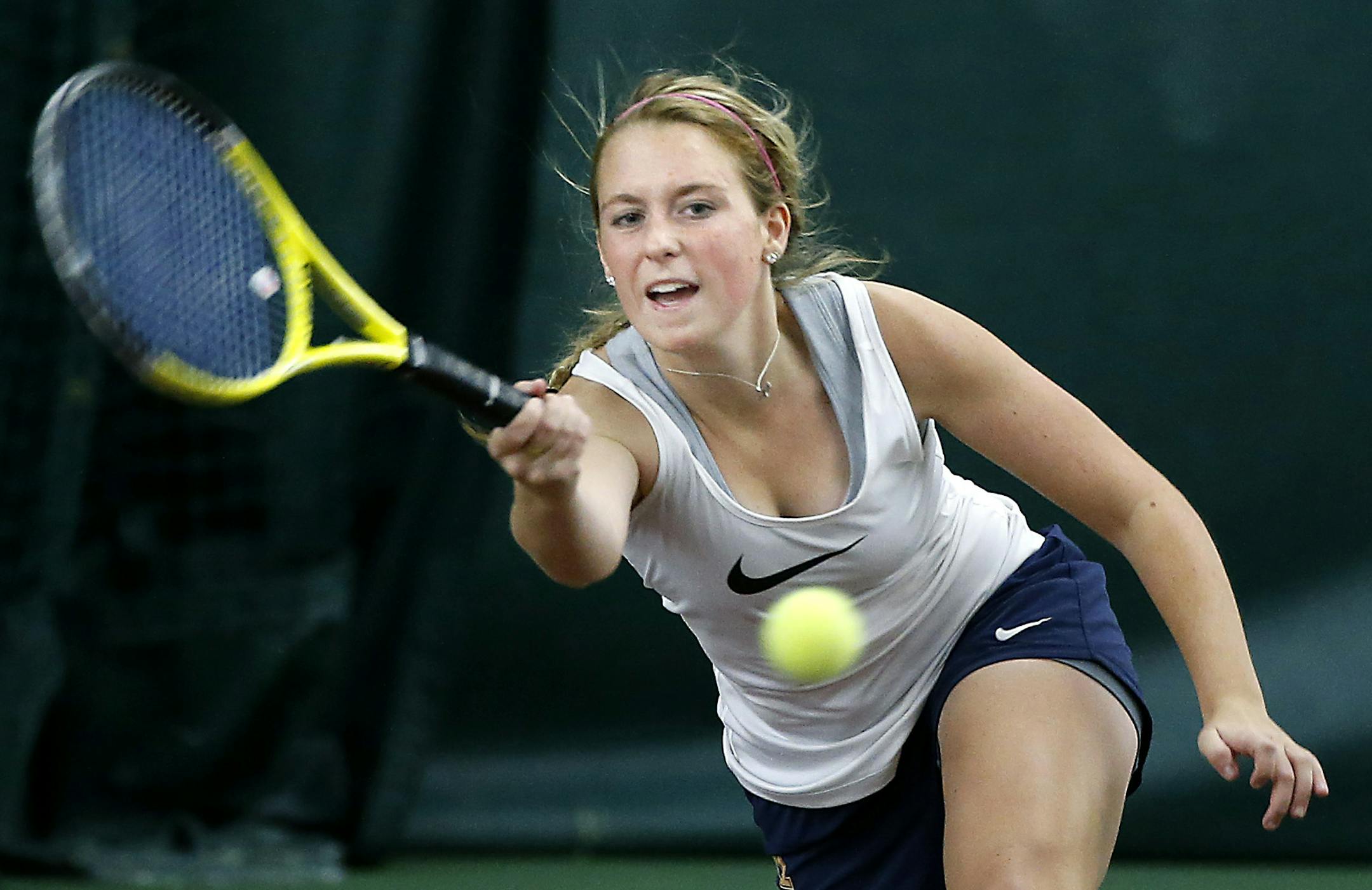 Mahtomedi's Hanna Shands made a forehand return to Rochester Mayo's doubles team during the Class 2A team preliminaries at Baseline Tennis Center at U of M, Tuesday, October 21, 2014 in Minneapolis, MN. Mahtomedi defeated Rochester Mayo. ] (ELIZABETH FLORES/STAR TRIBUNE) ELIZABETH FLORES • eflores@startribune.com