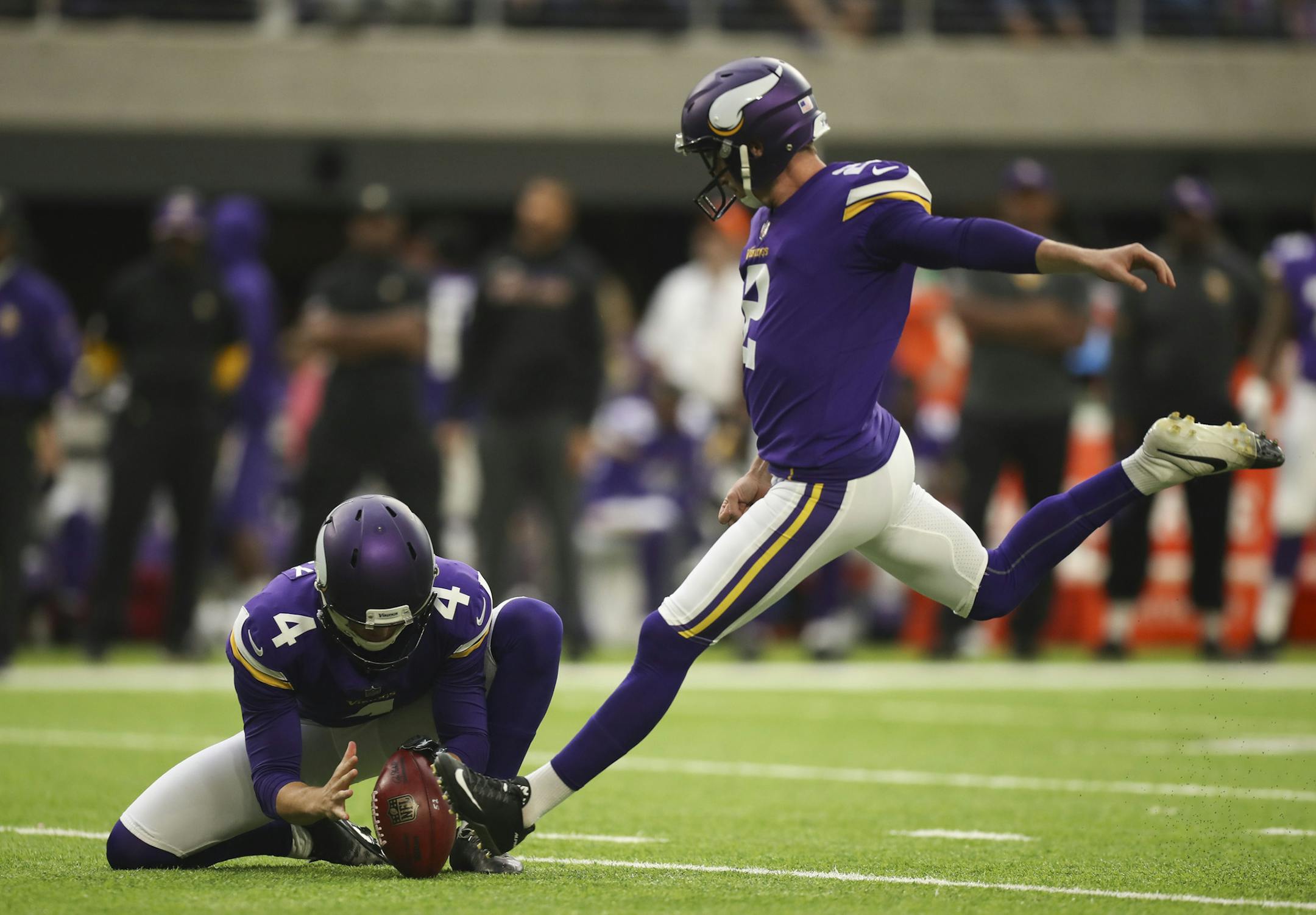 Vikings kicker Kai Forbath prepared to kick a field goal with holder Minnesota Vikings punter Ryan Quigley holding in the third quarter. He missed the 39 yard attempt when the ball hit the right upright.