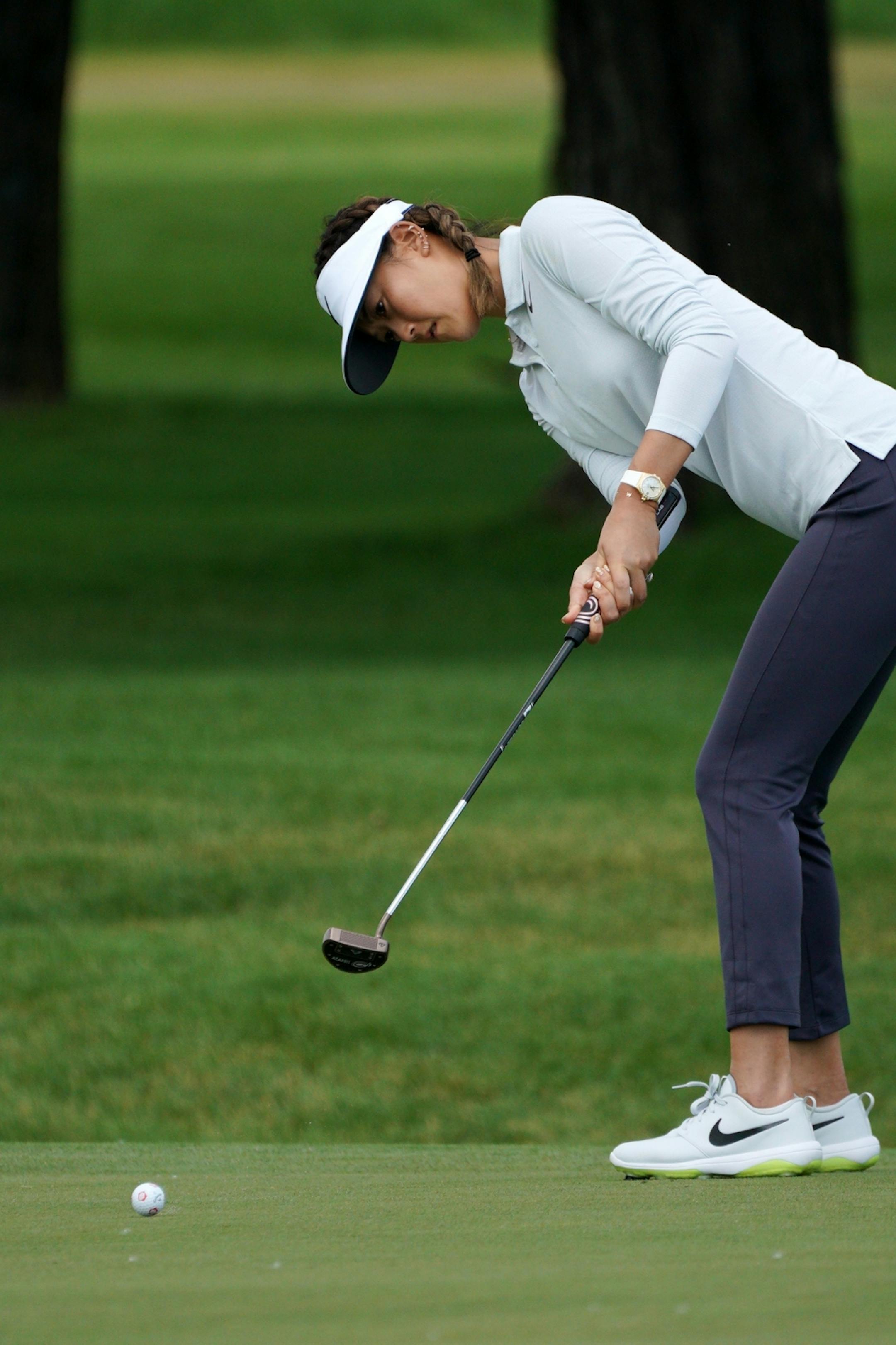 Michelle Wie sank a putt on the 1st hole green Tuesday afternoon.