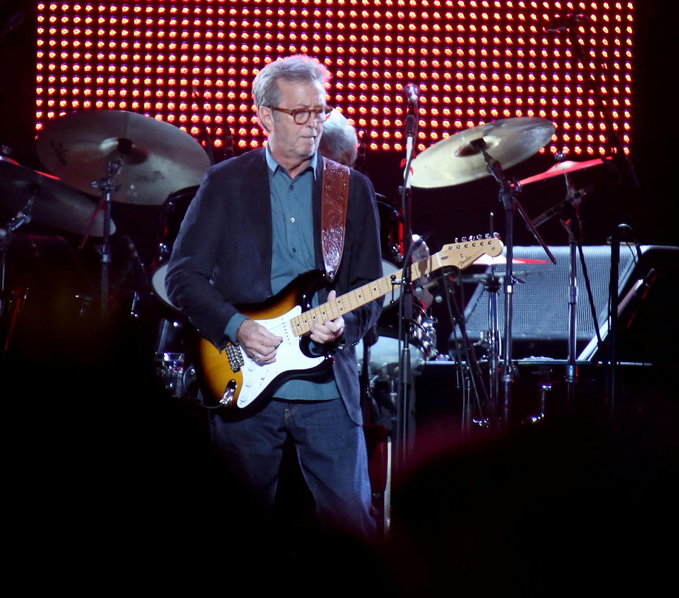 Eric Clapton, center, performs during his "70th Birthday Celebration" concert at Madison Square Garden on Friday, May 1, 2015, in New York. (Luiz C. Ribeiro/Invision/AP)