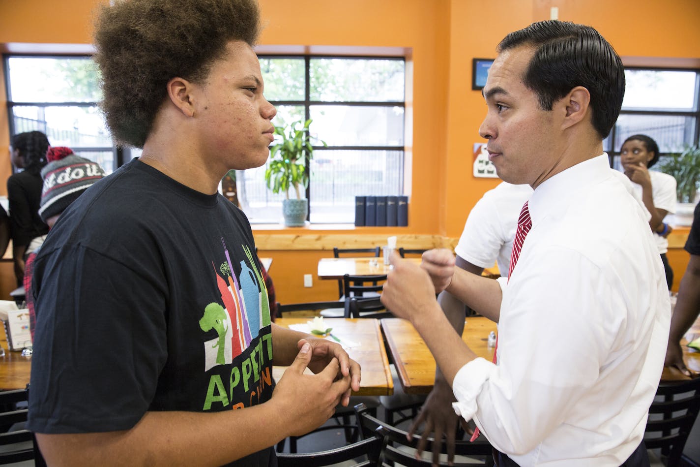 U.S. Department of Housing and Urban Development (HUD) Secretary Juli&#xb7;n Castro talks to Appetite for Change youth intern Dakota Jewell, 15, while touring Breaking Bread Foods during a visit to the Minneapolis Promise Zone in north Minneapolis on Thursday, August 6, 2015. ] LEILA NAVIDI leila.navidi@startribune.com / BACKGROUND INFORMATION: In April, HUD announced the expansion of the Promise Zones Initiative to eight additional cities from across the country, including Minneapolis, MN.