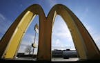 This Wednesday, Feb. 22, 2017, photo, shows the golden arches at sunset at a McDonald's restaurant in Robinson Township, Pa. McDonald&#xed;s Corp. say