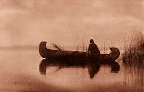 "Kutenai Duck Hunter," from northern Montana in 1910, captures daily life.
Edward S. Curtis' photos of North American Indians documented cultures unde