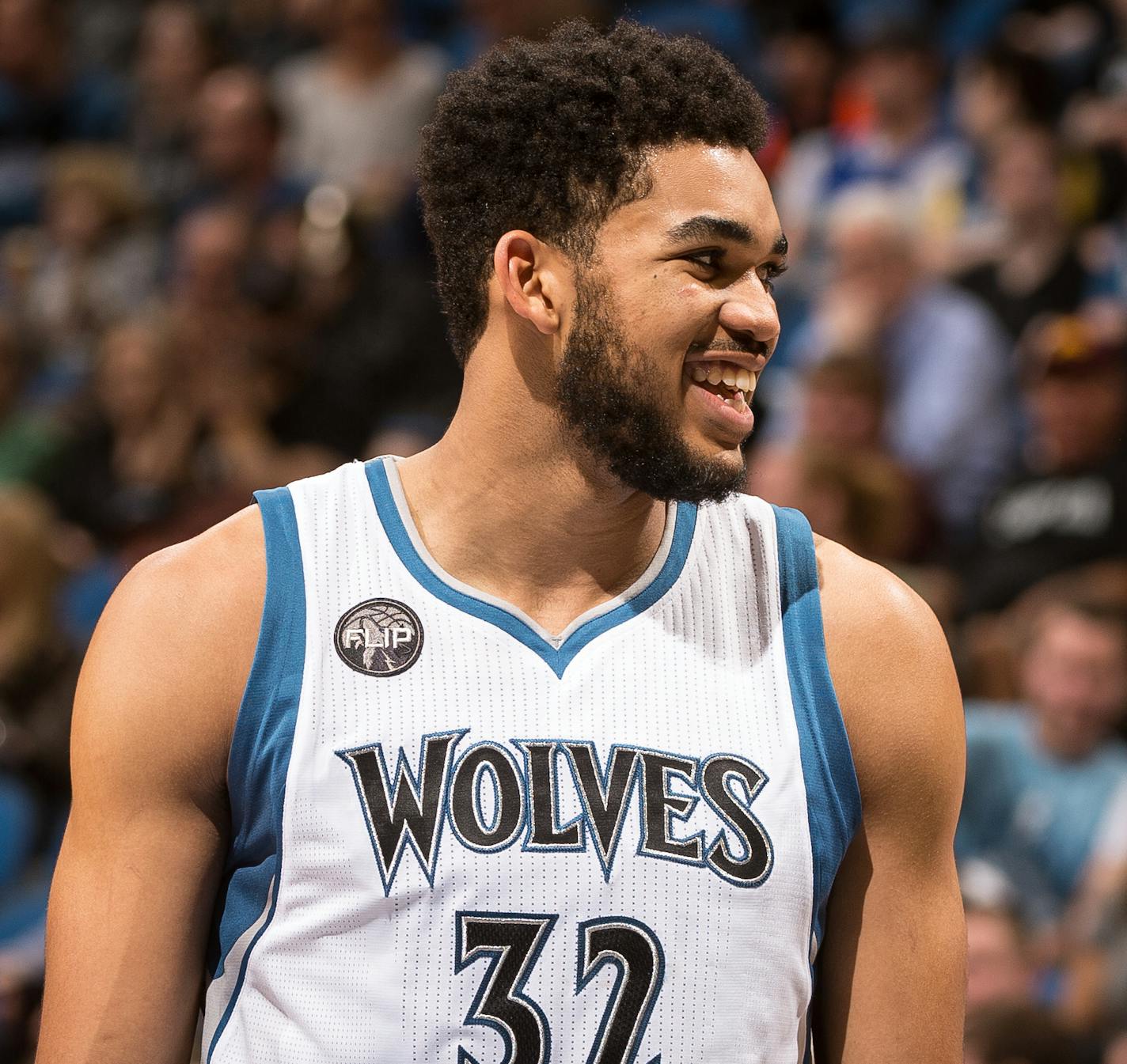 Minnesota Timberwolves center Karl-Anthony Towns (32) was all smiles during a break in action during the second half Wednesday. ] (AARON LAVINSKY/STAR TRIBUNE) aaron.lavinsky@startribune.com The Minnesota Timberwolves played the New Orleans Pelicans on Wednesday, April 13, 2016 at Target Center in Minneapolis, Minn,