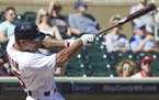 Minnesota Twins' Byron Buxton follows through on an RBI-single during the fourth inning of a baseball game, Sunday, Sept. 11, 2016, in Minneapolis. (A