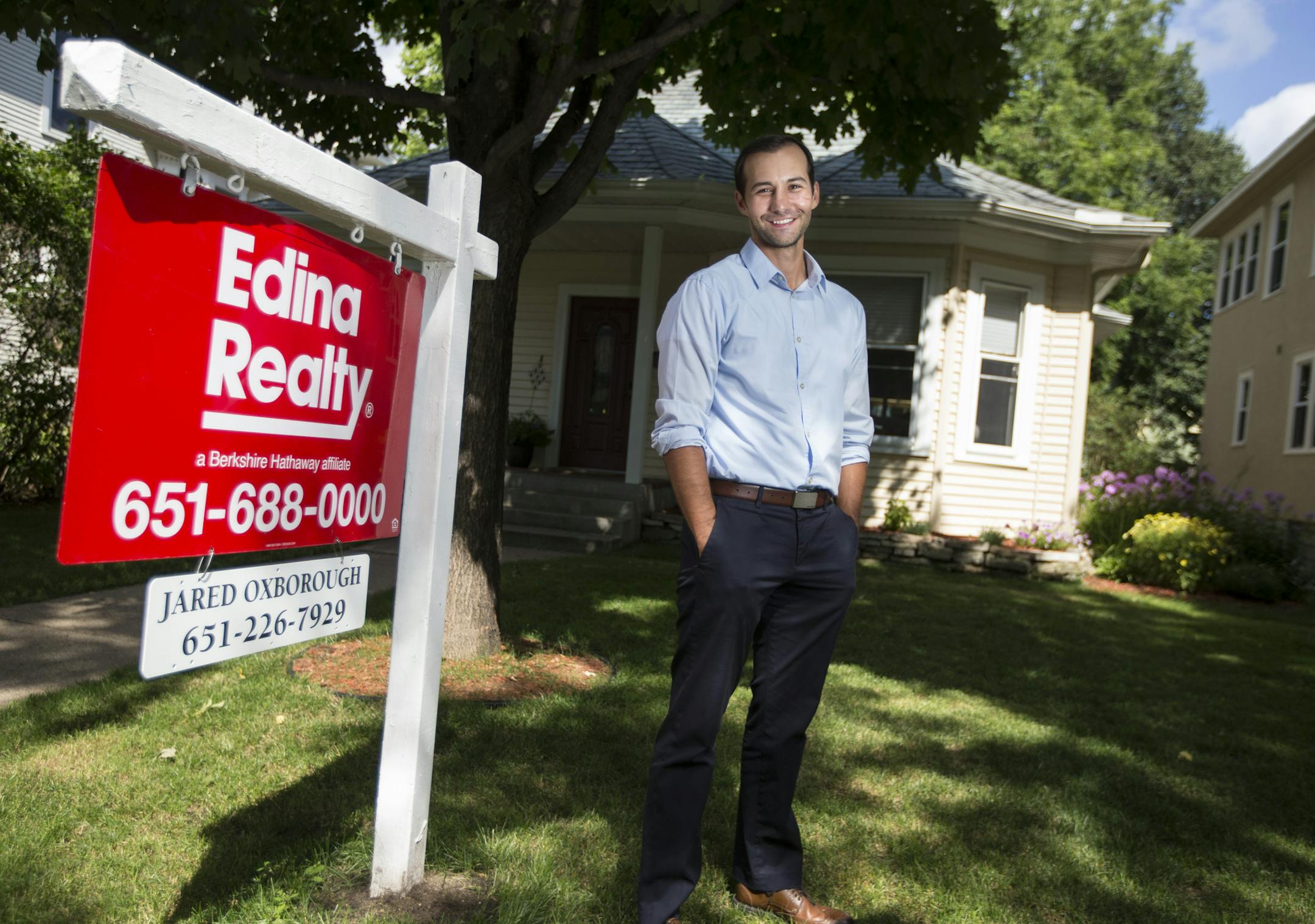 Jared Oxborough now sells real estate; he’s pictured at a listing in East Calhoun in Minneapolis.
