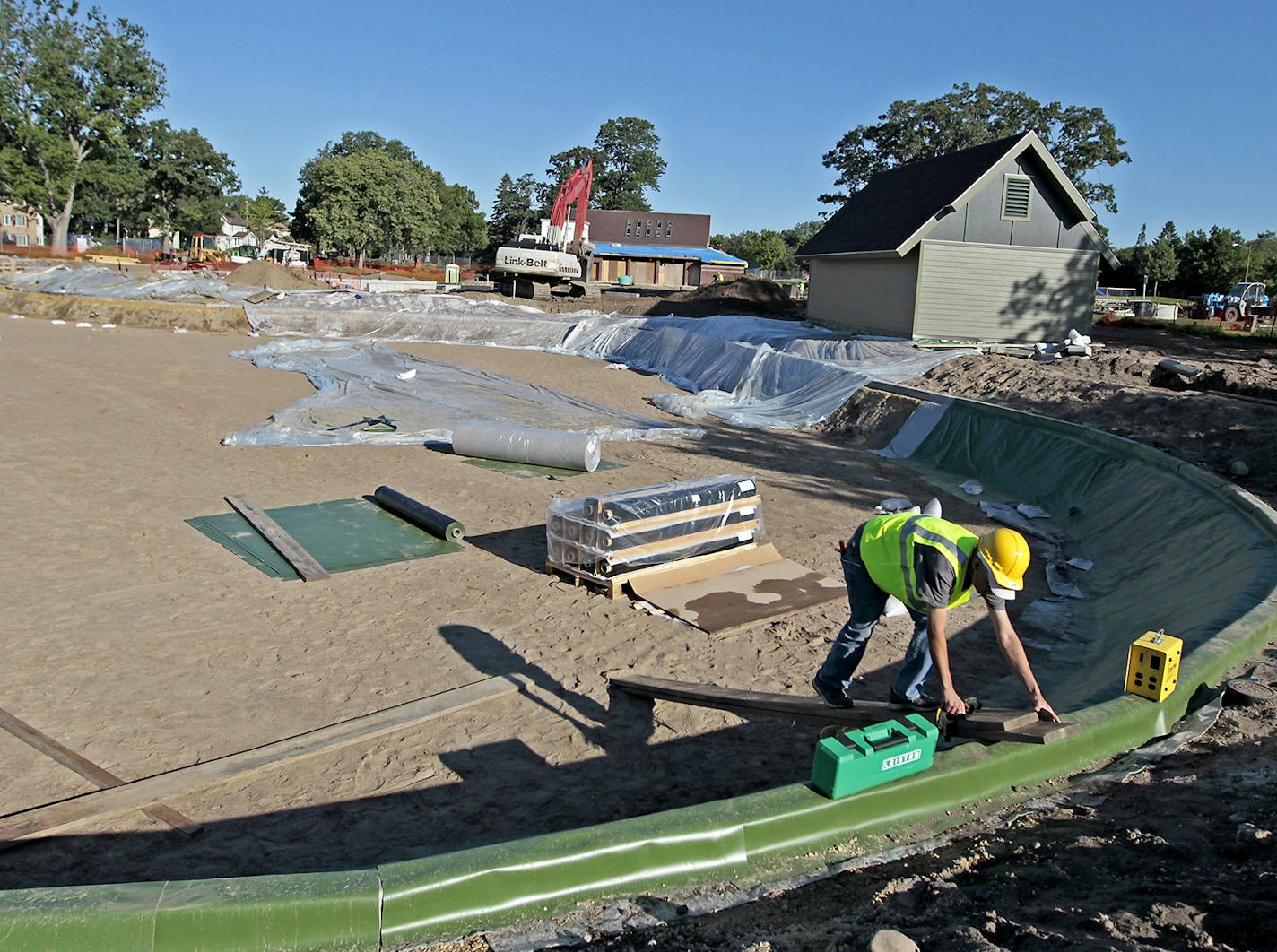 Construction crew worked on a filtration system early Wednesday, July 16, 2014 in Minneapolis, MN.