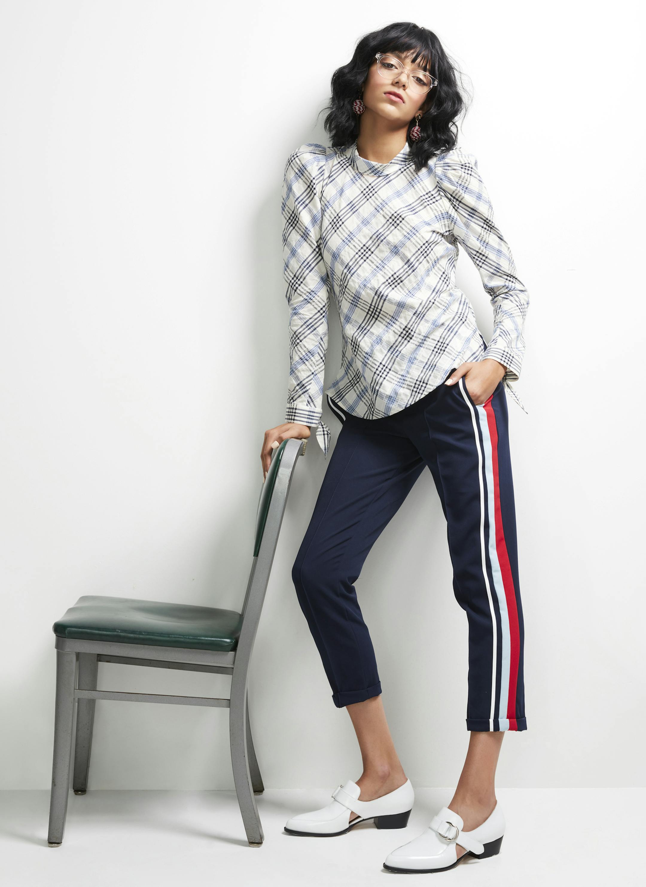 Racing Stripe
Veronica Beard blouse $105, Earrings $10, Derek Lamb shoes $220 nordstromrack.com
Stripe pants $46 zara.com Lucite eyewear similar at seeeyewear.com Photographer Lauren Krysti Creative Director and Stylist Barbara Schmidt, studiobstyle
Hair and Make-up Artist Fatima Olive
Model Megan Keefe, Ignite Models