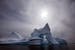 An iceberg melts off Ammassalik Island in Eastern Greenland.