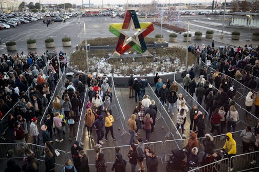 The line moves outside the north entrance as the mall opens for Black Friday shopping Friday, Nov. 25, 2022 at the Mall of America in Bloomington, Minn.