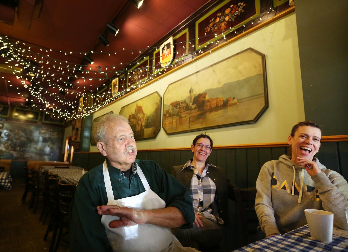 Erich Christ left and daughters Erica Christ, and Gina Christ talked about their years of ownership of the Black Forest restaurant Thursday Monday April 23, 2015.The Black Forest Inn celebrates 50 years on May 15, an anchor in a neighborhood that has evolved over the years, and a business still run by family. ] Jerry Holt/ Jerry.Holt@Startribune.com