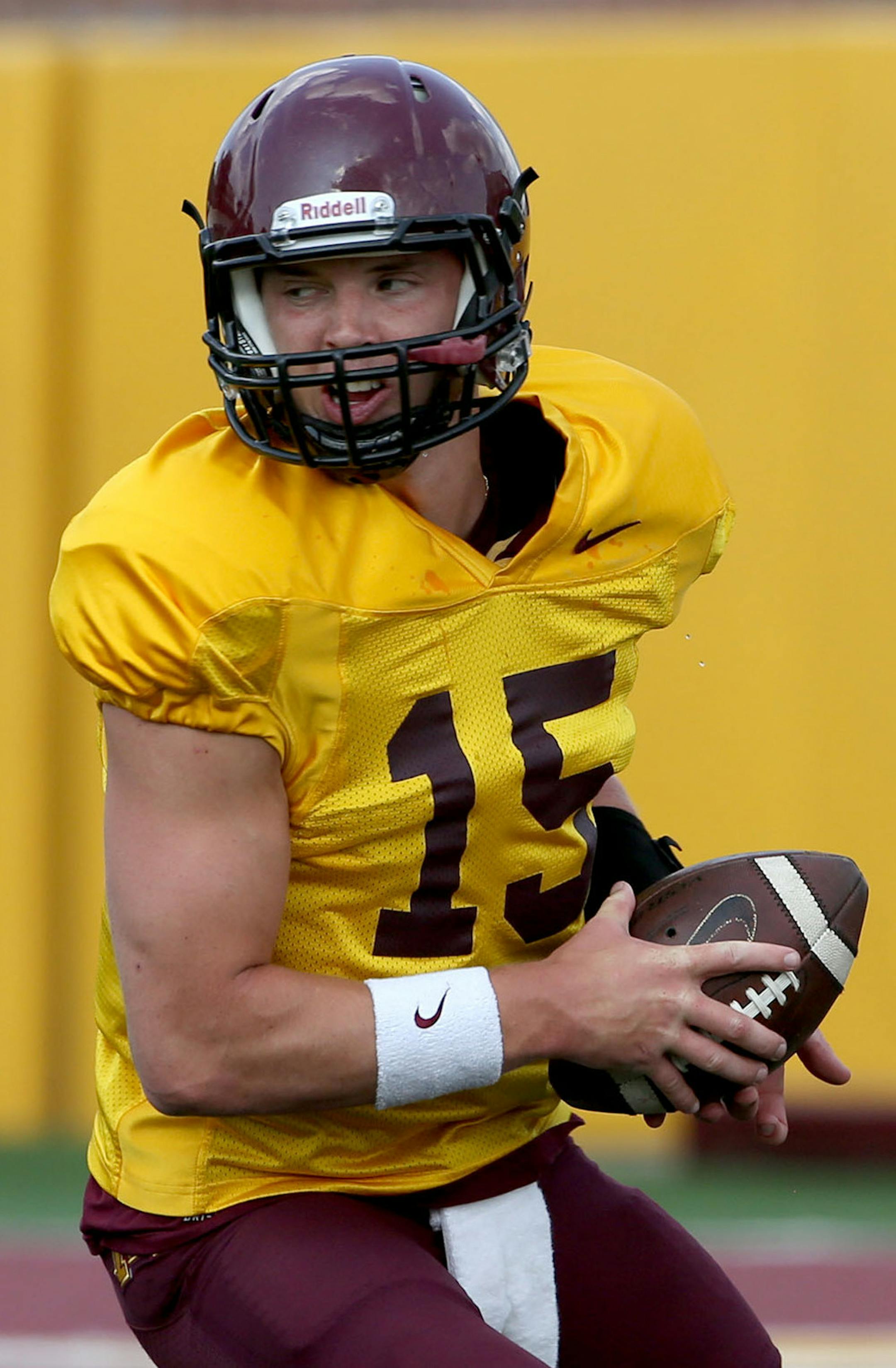 Quarterback Conor Rhoda prepared to pass the ball during practice. ] (KYNDELL HARKNESS/STAR TRIBUNE) kyndell.harkness@startribune.com Gophers practice in Minneapolis, Min. Wednesday, August, 6, 2014.