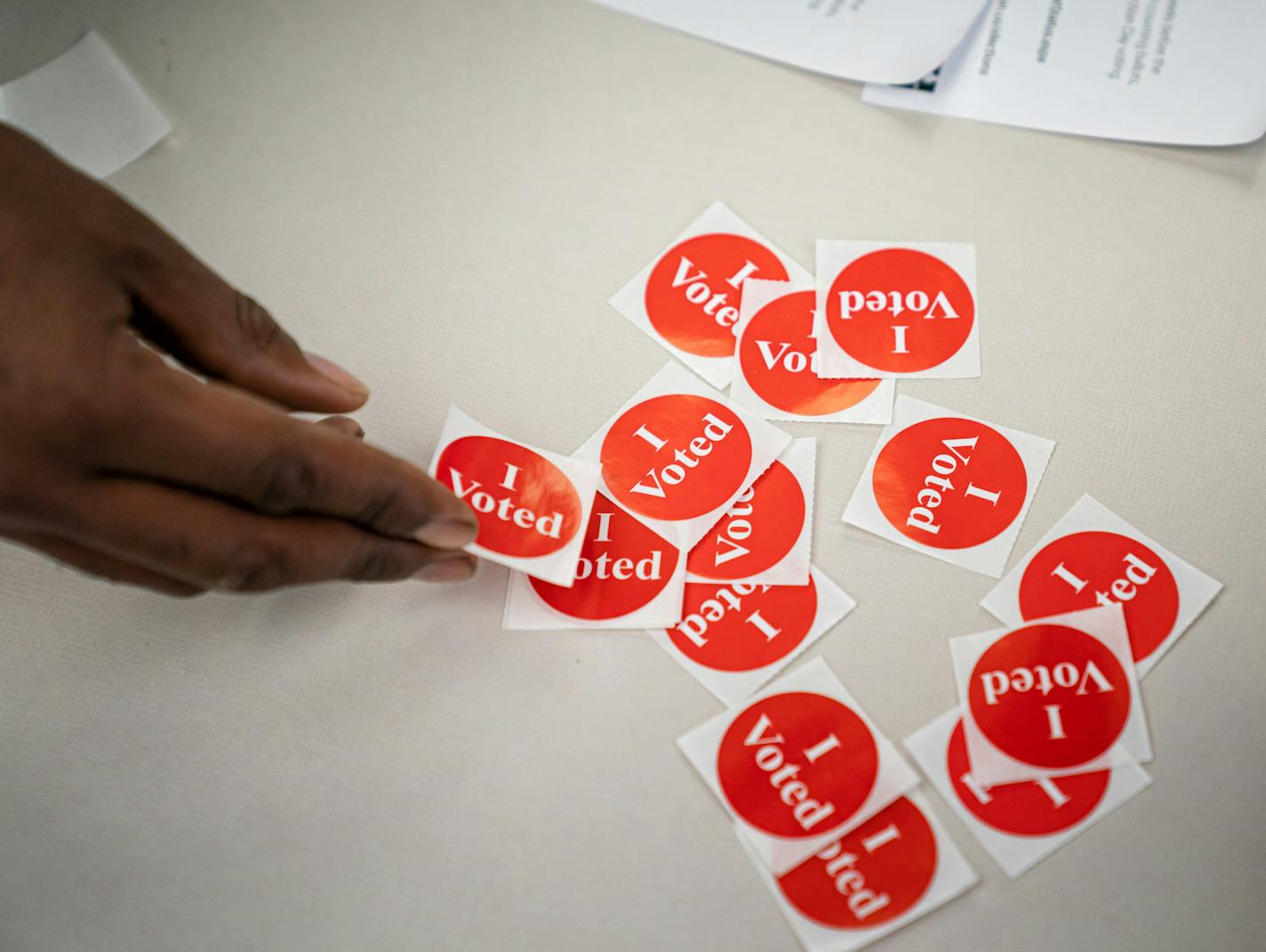 Victor Gaten put on an "I Voted" sticker after voting Wednesday at the Hennepin County Government Center. ] GLEN STUBBE • glen.stubbe@startribune.com Wednesday, October 21, 2020 Voting data analyzed by the Star Tribune finds voter turnout in the precincts with the highest concentration of Black voters dropped from 2012, when Barack Obama easily carried the state, to 2016, when Hillary Clinton nearly lost it. In a presidential election year that also saw a nationwide reckoning over race originate