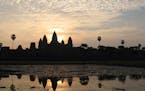 The conical shaped towers of Angkor Wat compete with the sun for a high point in the sky. Visitors to Angkor Wat in Siem Reap, Cambodia, will rarely f
