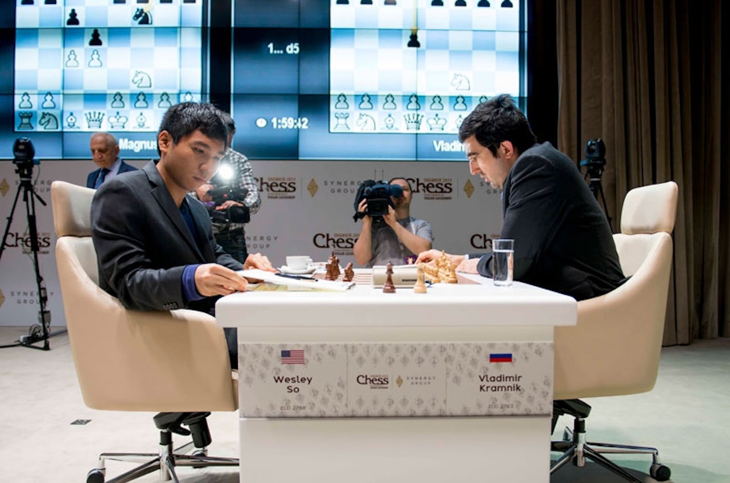 Wesley So, left, prepares for his second-round game against former world chess champion Vladimir Kramnik at the Gashimov Memorial tournament in Shamkir, Azerbaijan.