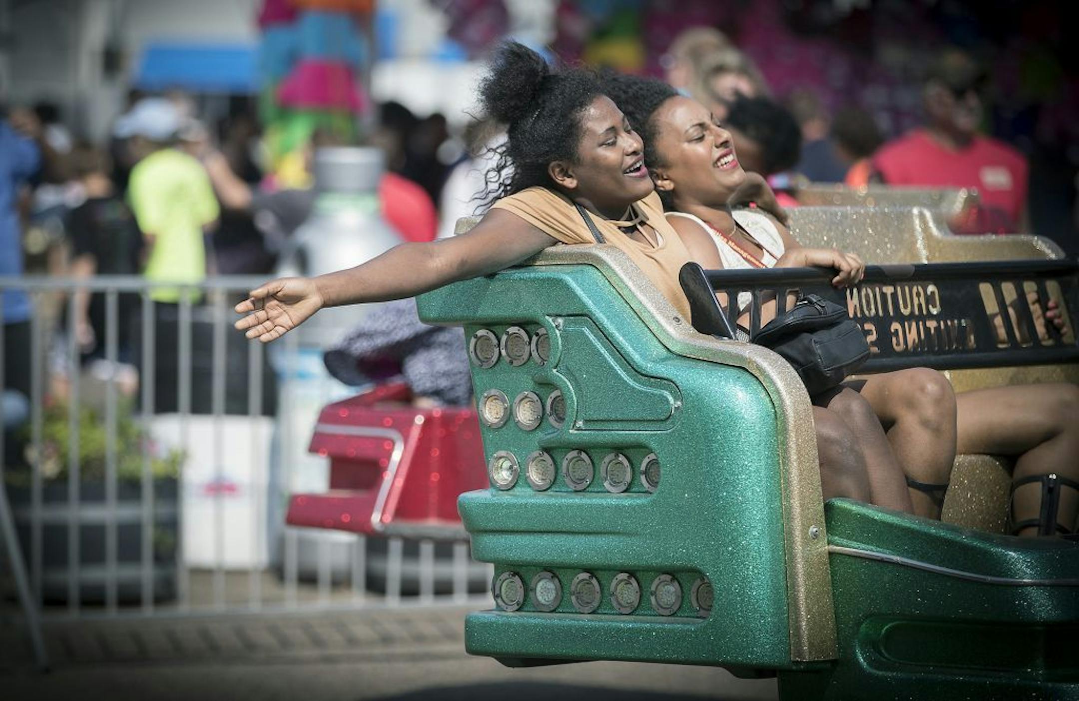 Bilise Berkessa, left, and Ayantu Gebremarem, cq, enjoyed one of the rides on the Midway during the last day of the Minnesota State Fair, Monday, September 4, 2017 in Falcon Heights, MN.
