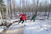Ice skaters take on the frozen trails of Lester Park in Duluth.