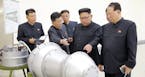FILE - This undated file photo distributed on Sunday, Sept. 3, 2017, by the North Korean government, shows North Korean leader Kim Jong Un, second fro