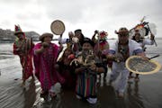 Peruvian shamans perform a ritual against the alleged 2012 apocalyptic Mayan prediction in Lima, Peru, Thursday, Dec. 20, 2012. The supposed 5 a.m. Fr