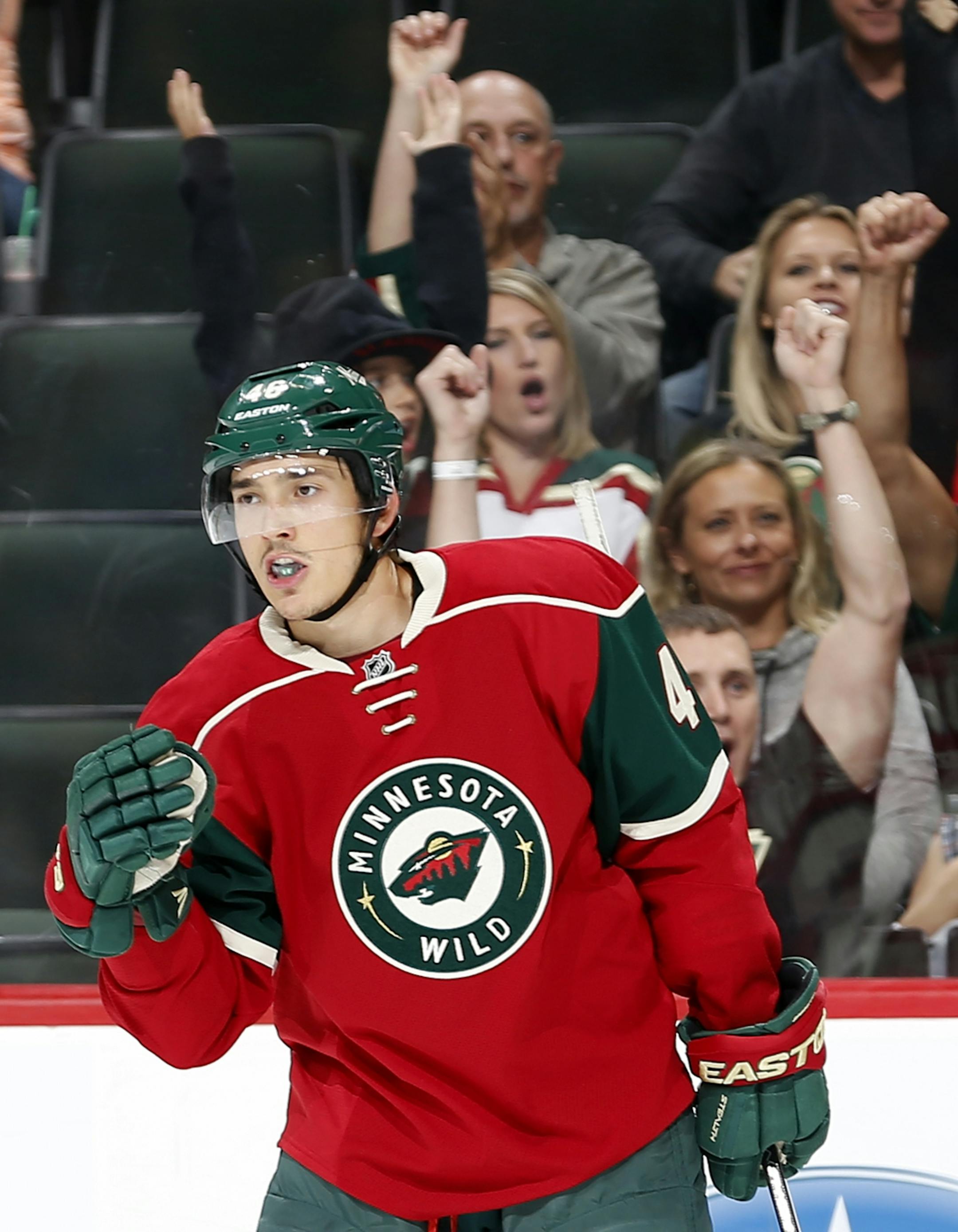 Jared Spurgeon (46) celebrated a goal in the first period.