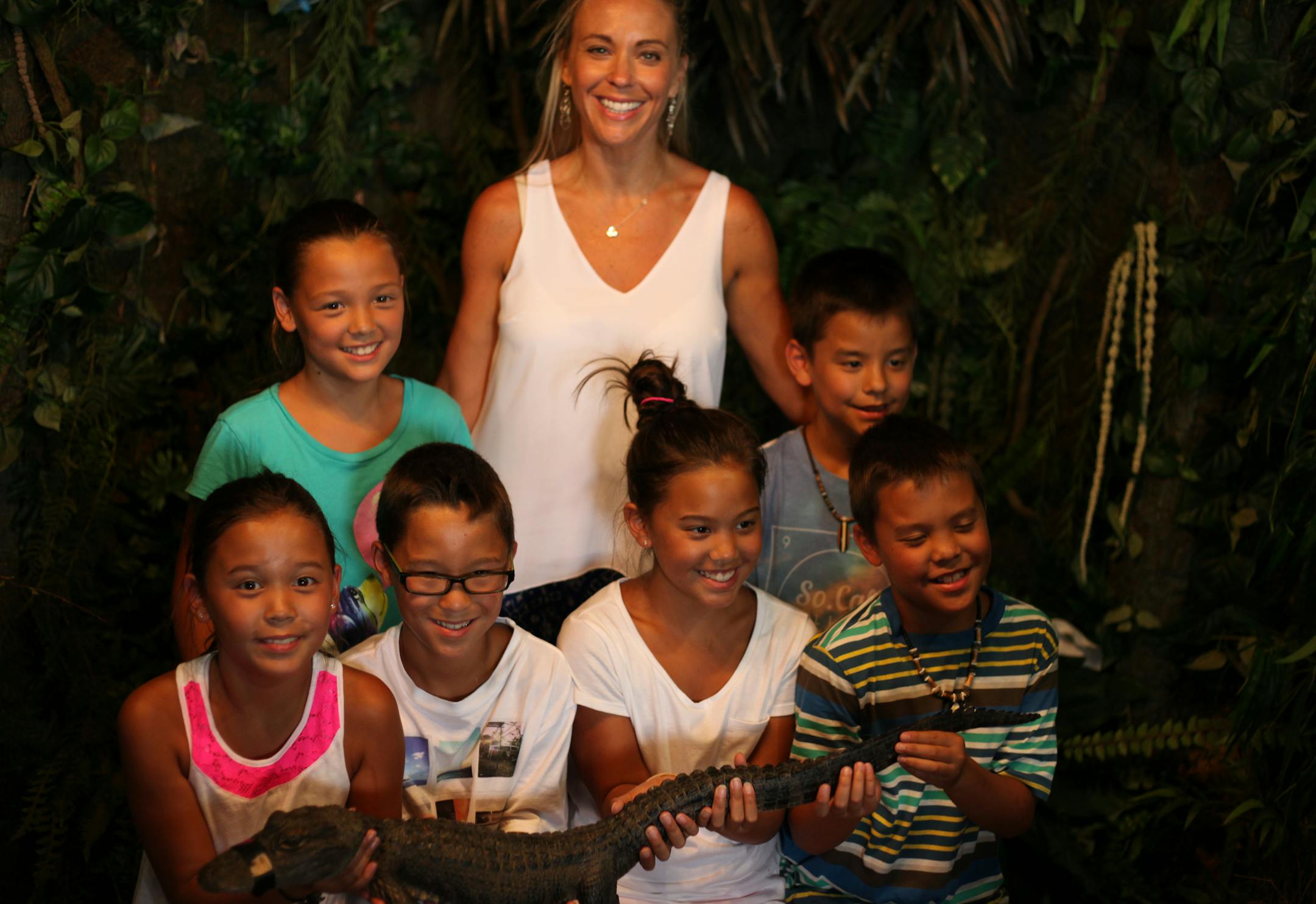 Kate and the little kids with a baby alligator in season 4 of "Kate plus 8" on TLC. ORG XMIT: Producer Deliverable